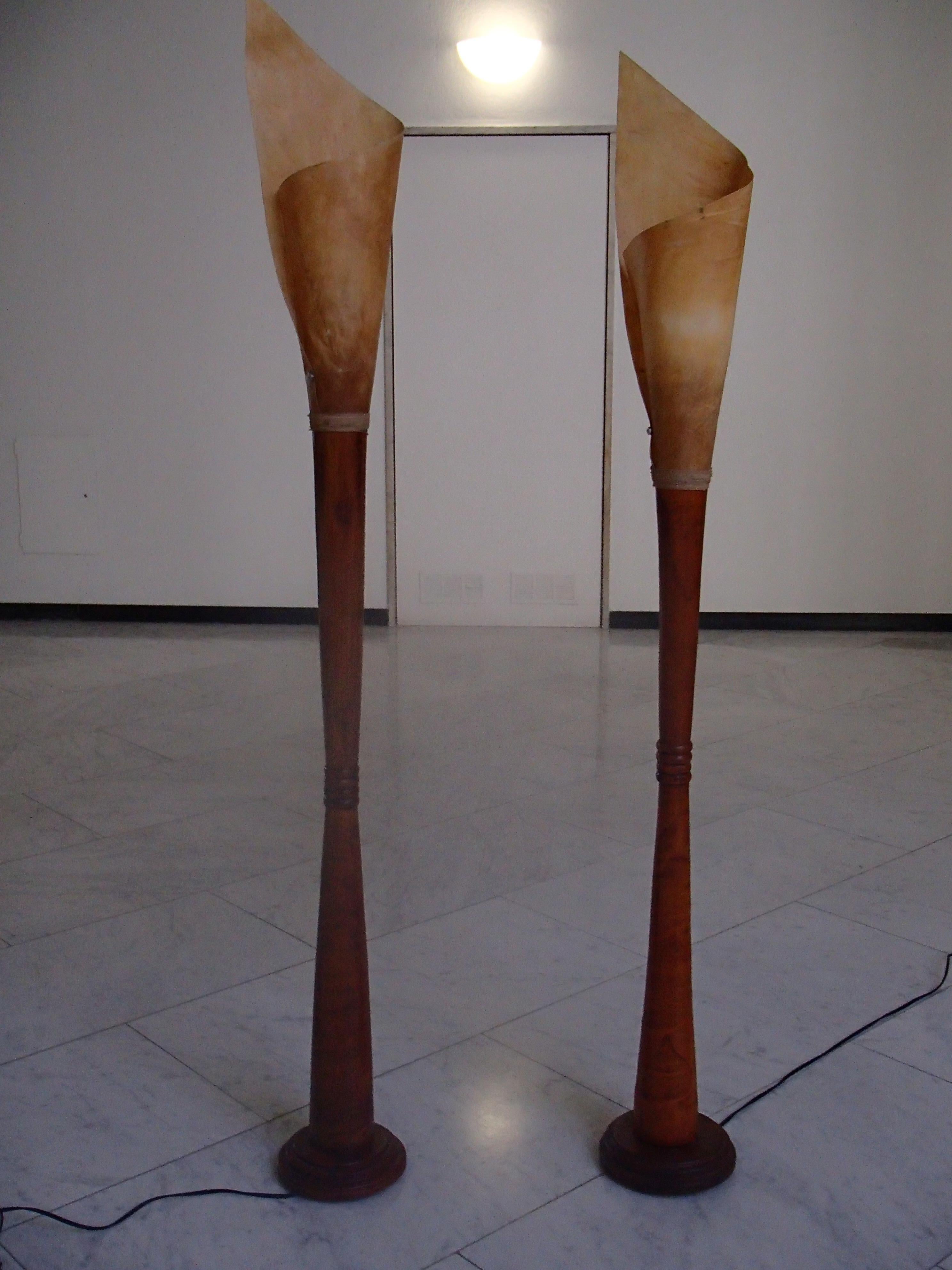 Mid-Century Modern pair handmade floor lamps wood and rolled skin shades. They are slightly different as they are handmade. One is 180 cm the other 175 cm high.