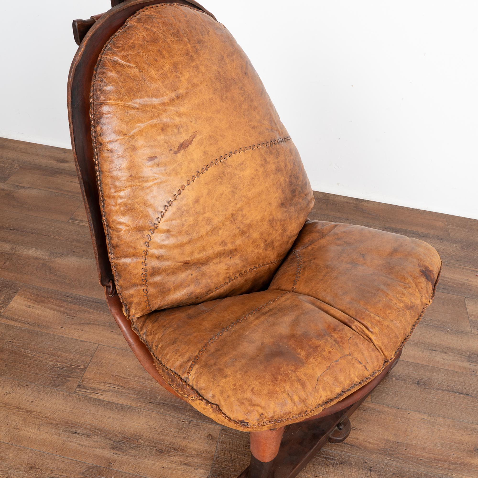 Mid Century Brutalist Patched Vintage Leather Lounge Chair, Brazil 1960's In Good Condition For Sale In Round Top, TX