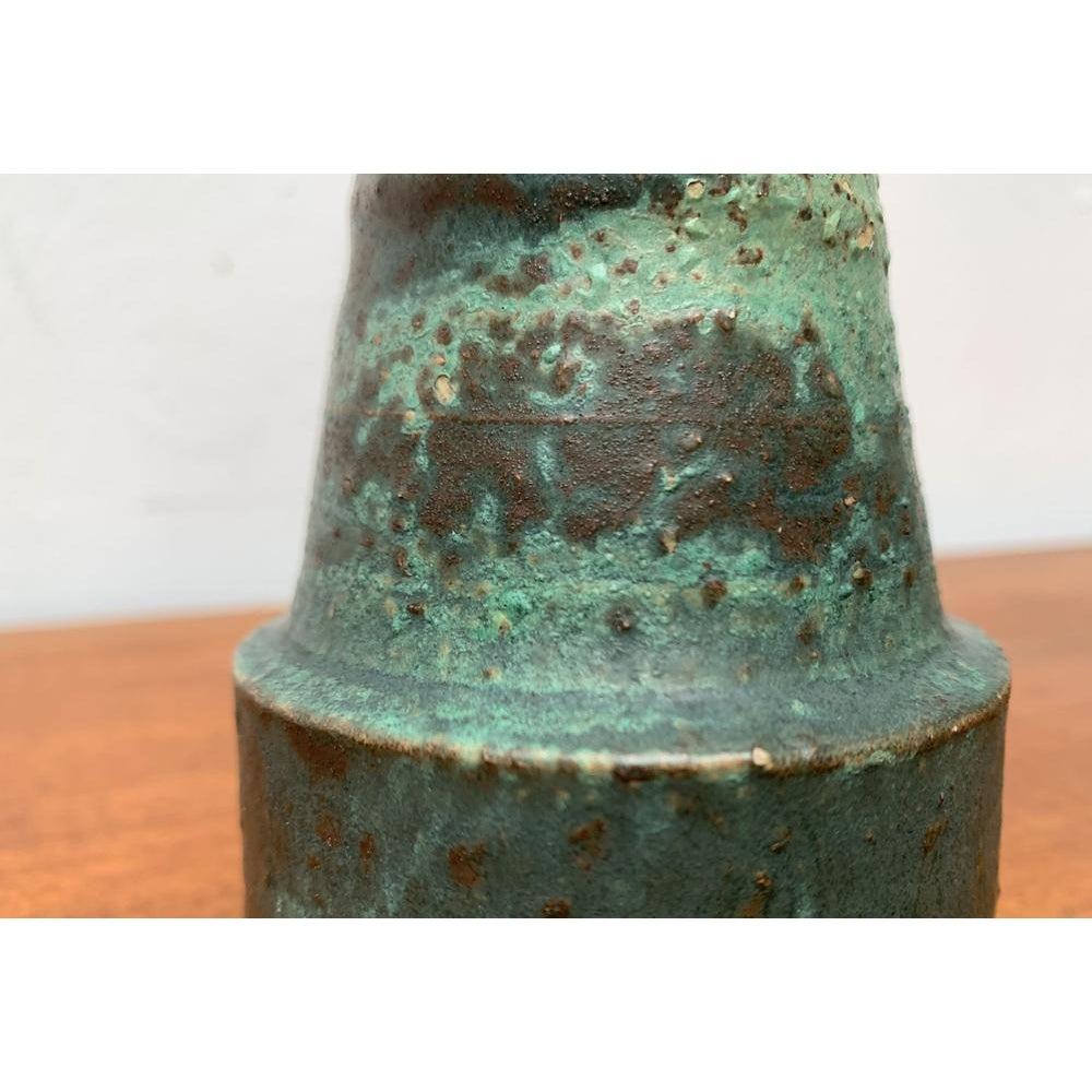 Mid-Century Brutalist Pottery Vase from Mobach, 1960s, in Very Good conditions. Designed 1960 to 1969 This piece has an attribution mark.

Additional information:
Material: Ceramic
Color: Green
Styles: Brutalist, Mid-Century Modern
Item Type: