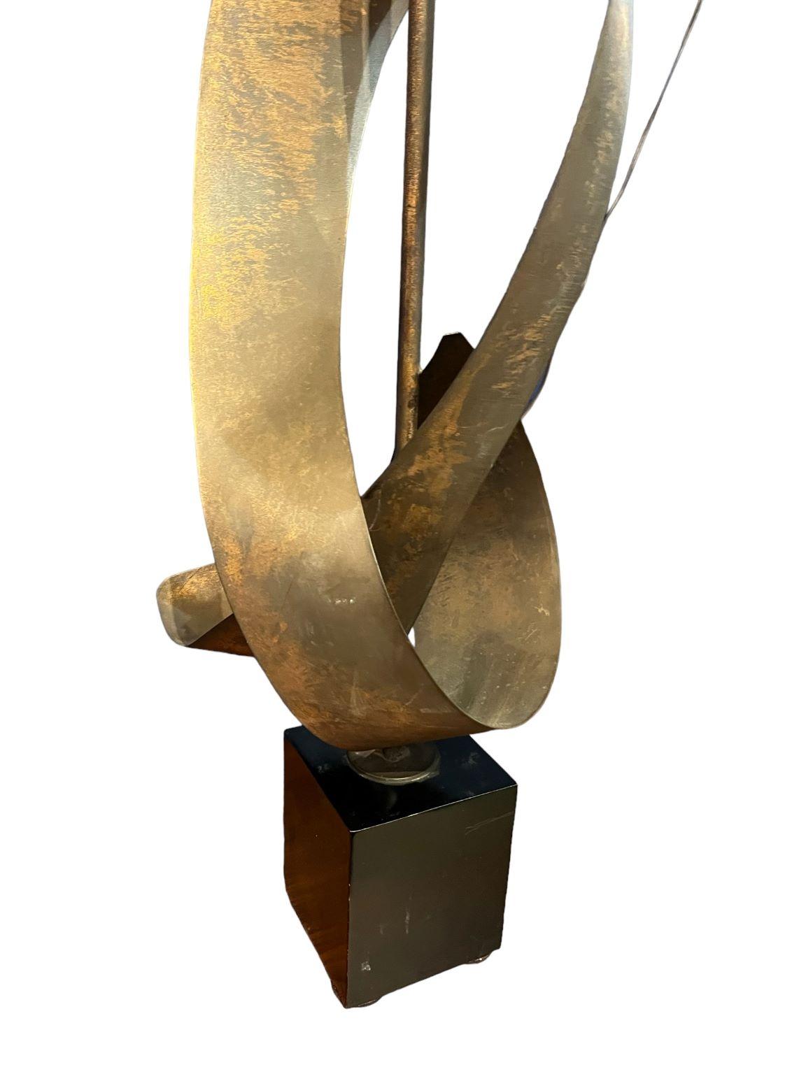 Brutalist lamp by Richard Barr for the Laurel Lamp Company, Newark, N.J. Abstract ribbon shape on black enamel painted square base. Original lamp and shade. Wonderful modern sculptural art, will add significant presence to any setting. 18 inches