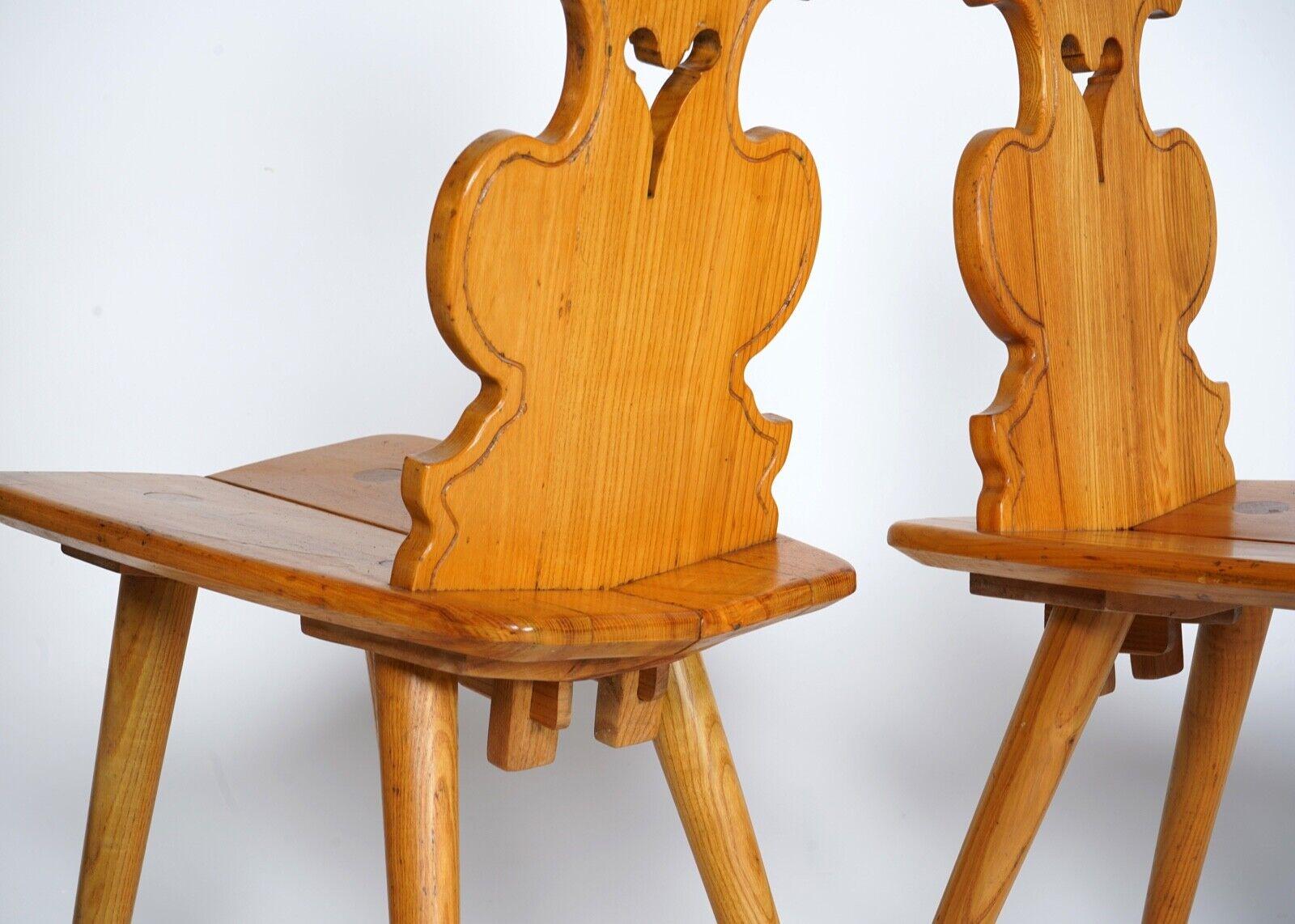 pair of sculptural Polish Capelia chairs in solid pine.
Made in the 1960s.
These chairs have some marks and signs of use but are solid and usable.

In good used condition. As a vintage piece there are signs of wear and small imperfections, which
