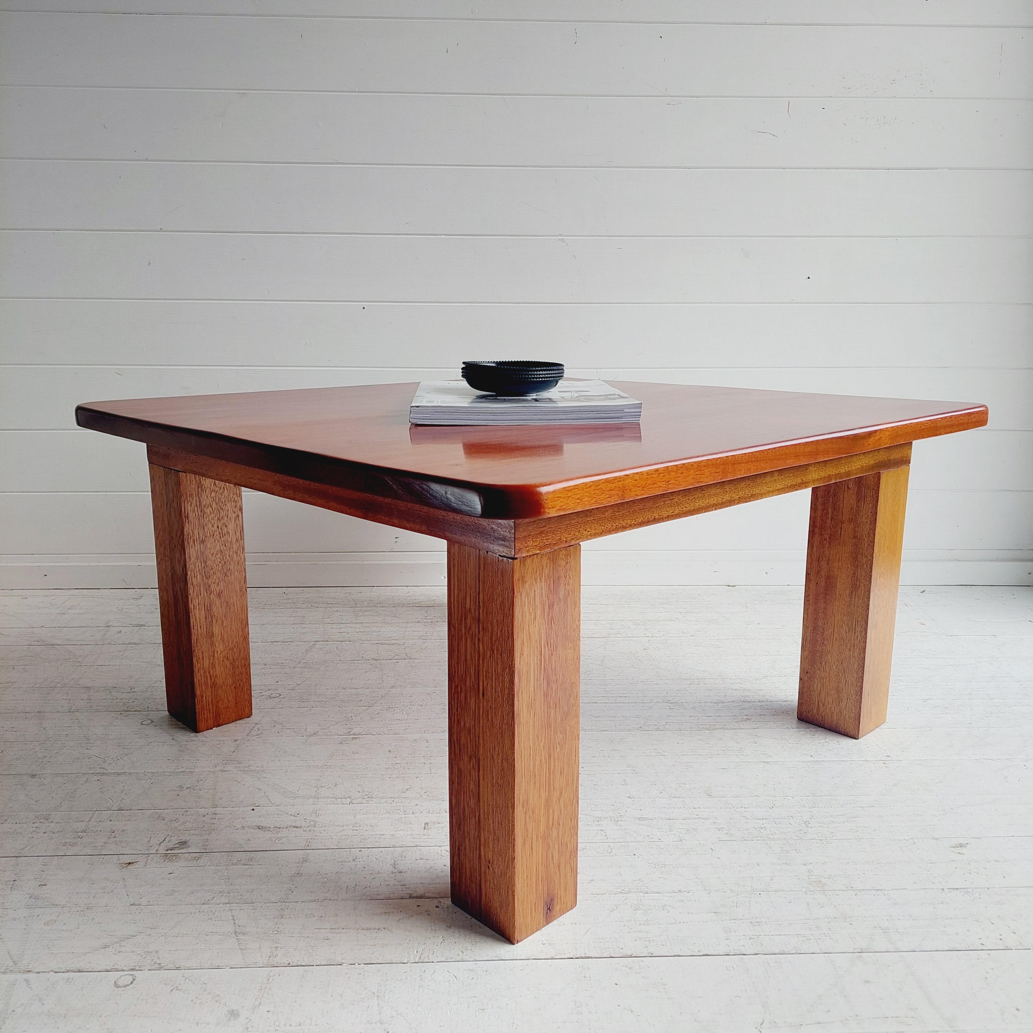 A beautiful and stunning large restored Teak square coffee table designed in the manner of Pierre Chapo.
Simple and no-nonsense, this example of repurposed art allows the knots, grains and imperfections of the wood to shine in a low table rich in