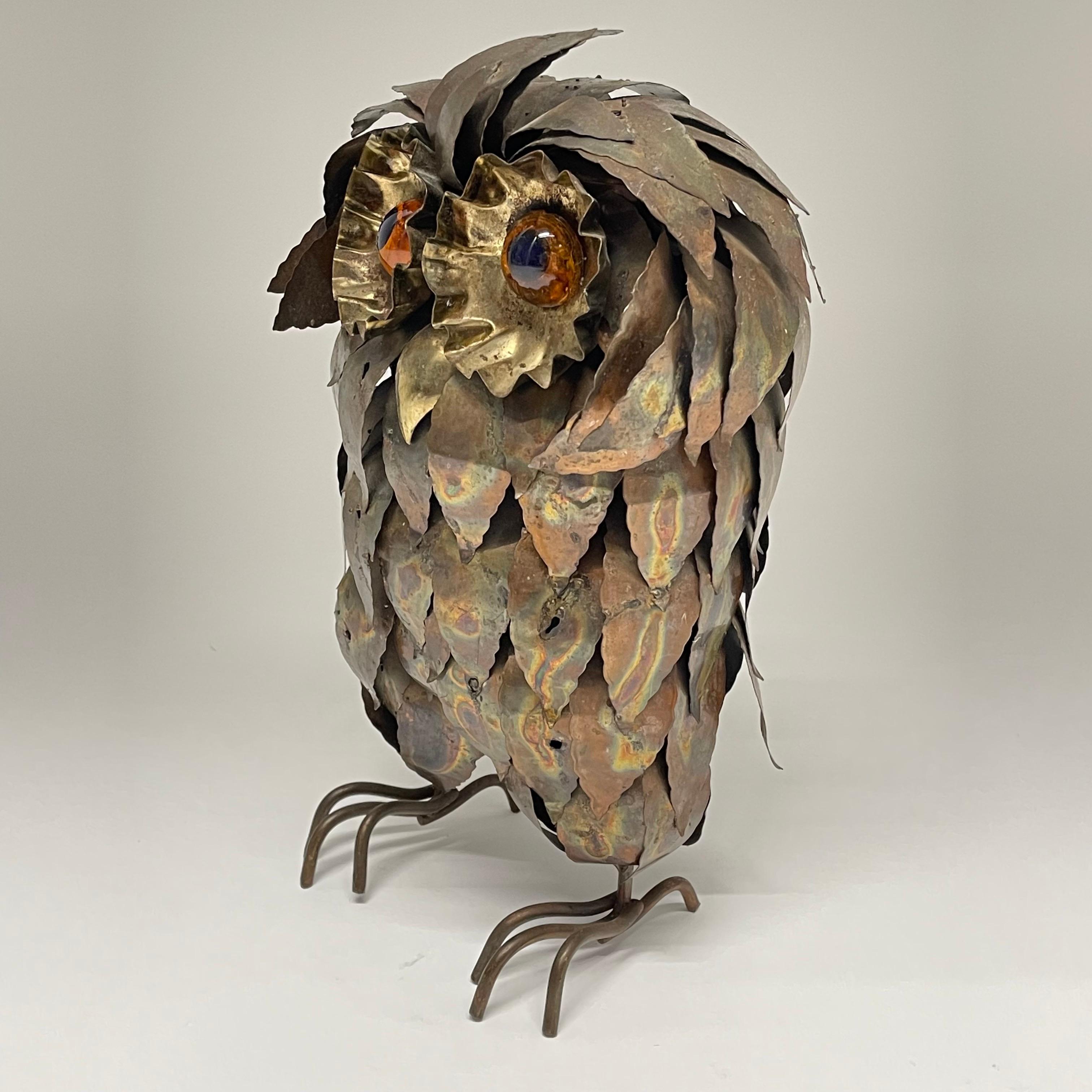 Midcentury Brutalist owl sculpture, rendered in torch cut copper and brass with amber resin eyes, circa 1970s.