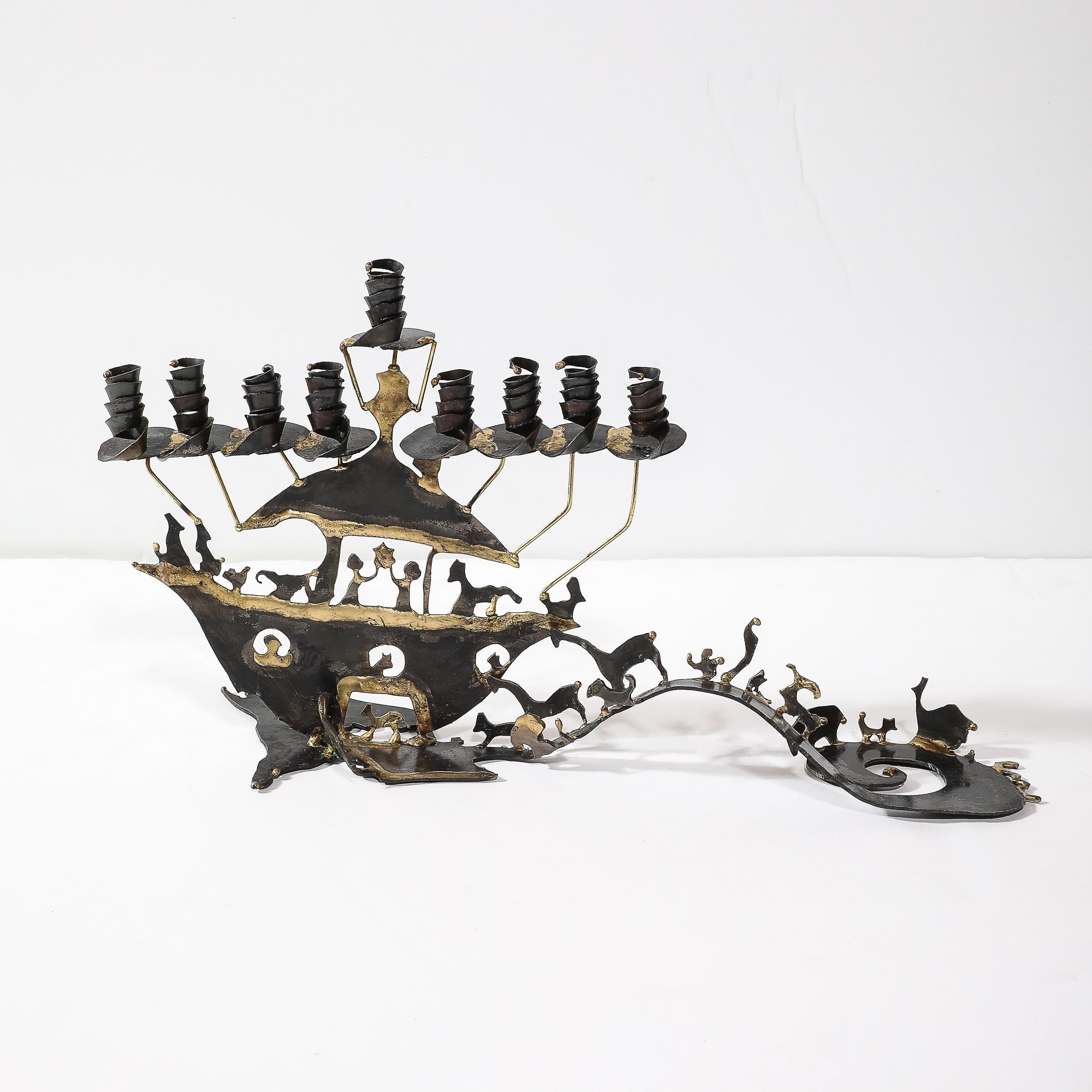 This striking Mid-Century Brutalist menorah, crafted in America circa 1980, is a true masterpiece of sculptural art and storytelling. Fashioned from patinated brass, the menorah features a dramatic torch-cut design that epitomizes the raw and bold