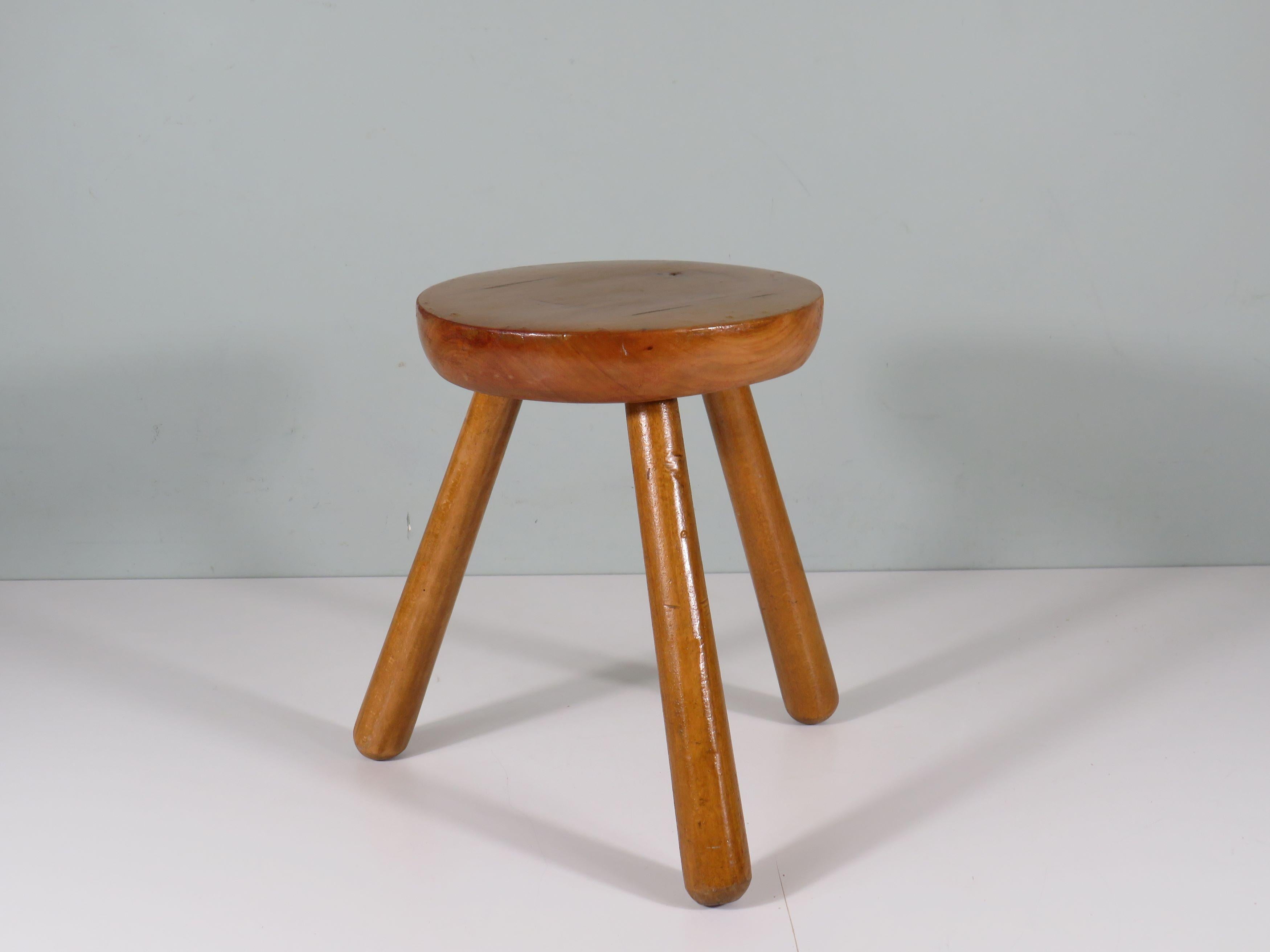 Varnished Mid century, brutalist tripod stool in the style of Perriand. France 1960s