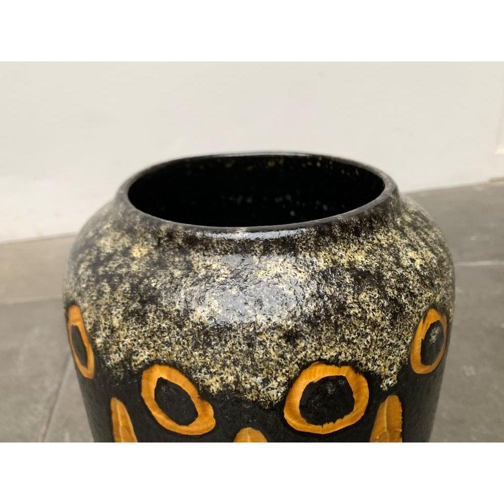 Mid-Century Brutalist West German Pottery WGP Floor Vase from Scheurich, 1960s, in Very Good conditions. Designed 1960 to 1969 This piece has an attribution mark.

Additional information:
Material: Ceramic
Color: Black
Styles: Brutalist, Mid-Century