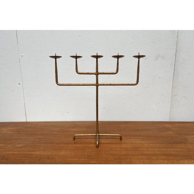 Mid-Century Brutalist Wrought Iron Candleholder, 1960s, in Very Good conditions. Designed 1960 to 1969

Additional information:
Style: Brutalist, Mid-Century Modern
Color: Black
Item Type: Vintage, Antique or Pre-owned
Dimensions: 18.11ʺW × 7.09ʺD ×