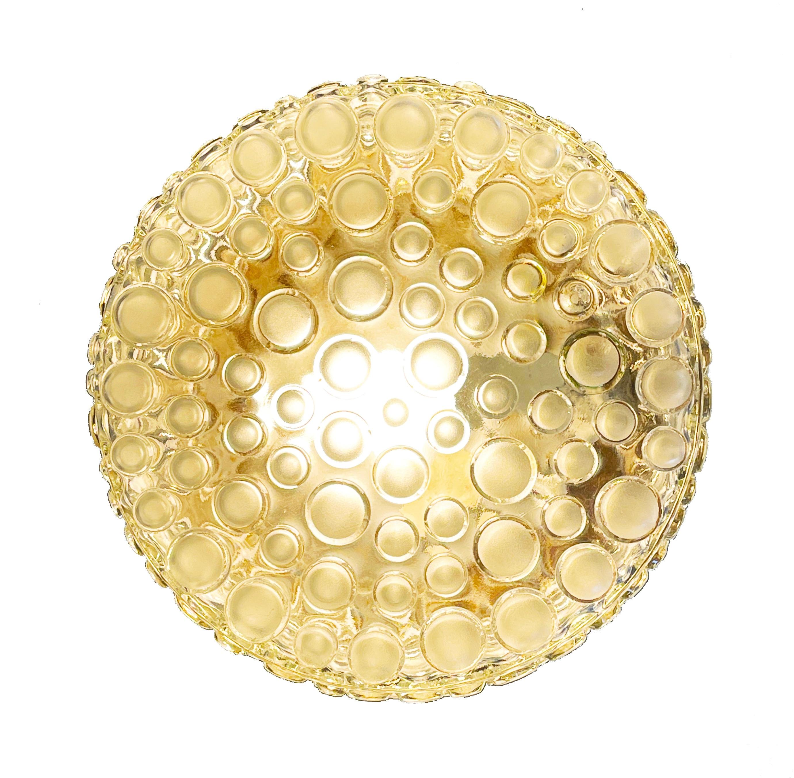 Magnificent, flush base ceiling or wall lamp by ''Hustadt Leuchten'', one of Germans famous mid century manufacturer of high-end design lighting.
Comes in a round shape with frosted bubbles.
Beautiful warm light.

Can be wall or ceiling mounted.
The