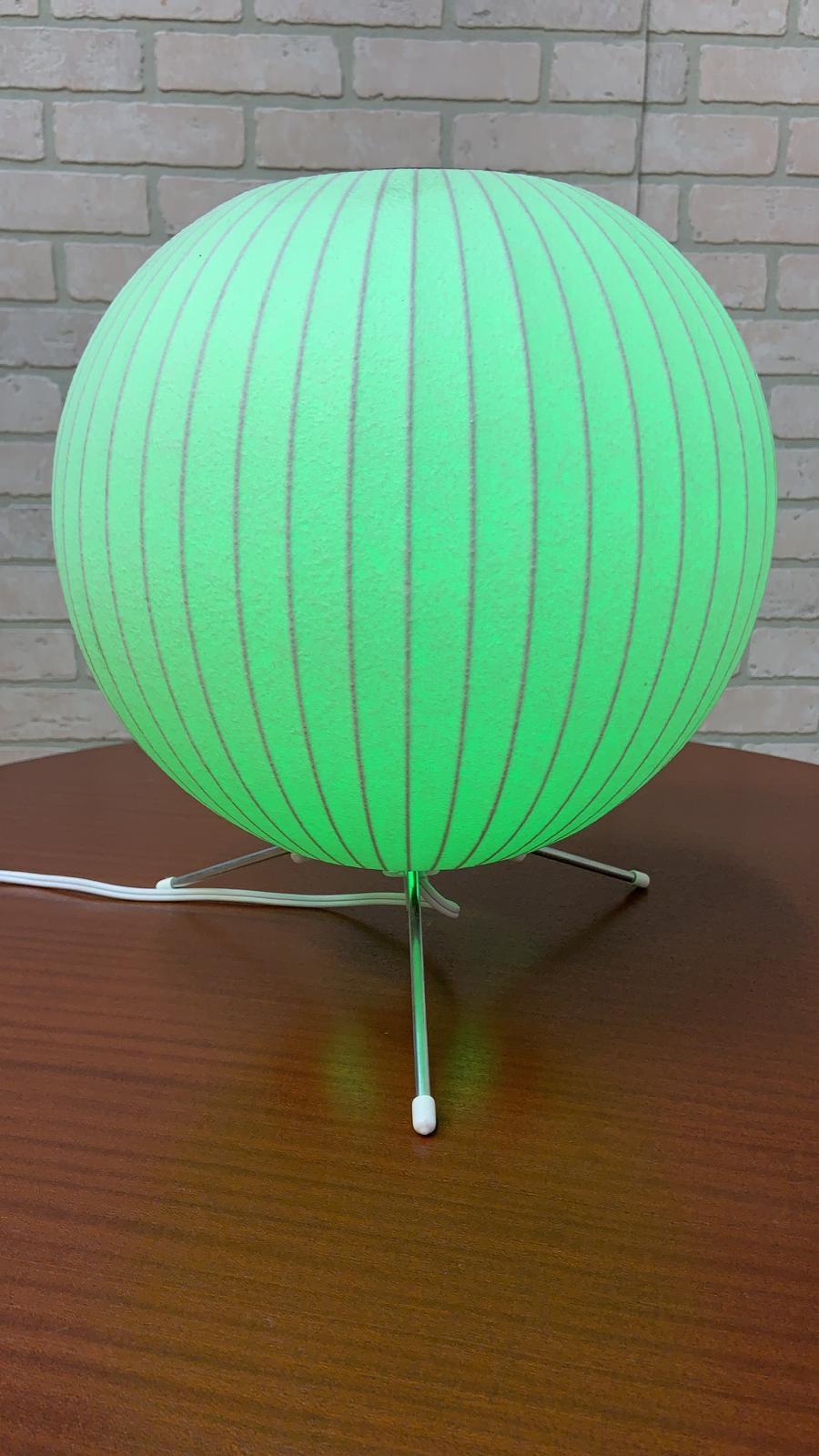 Vintage Mid Century Modern Bubble Lamp Ball with Tripod Stand by George Nelson for Herman Miller 

The MCM George Nelson Bubble Lamp will add a touch of softness and luminosity to you interior. Designed by George Nelson in 1952, this elegant fixture