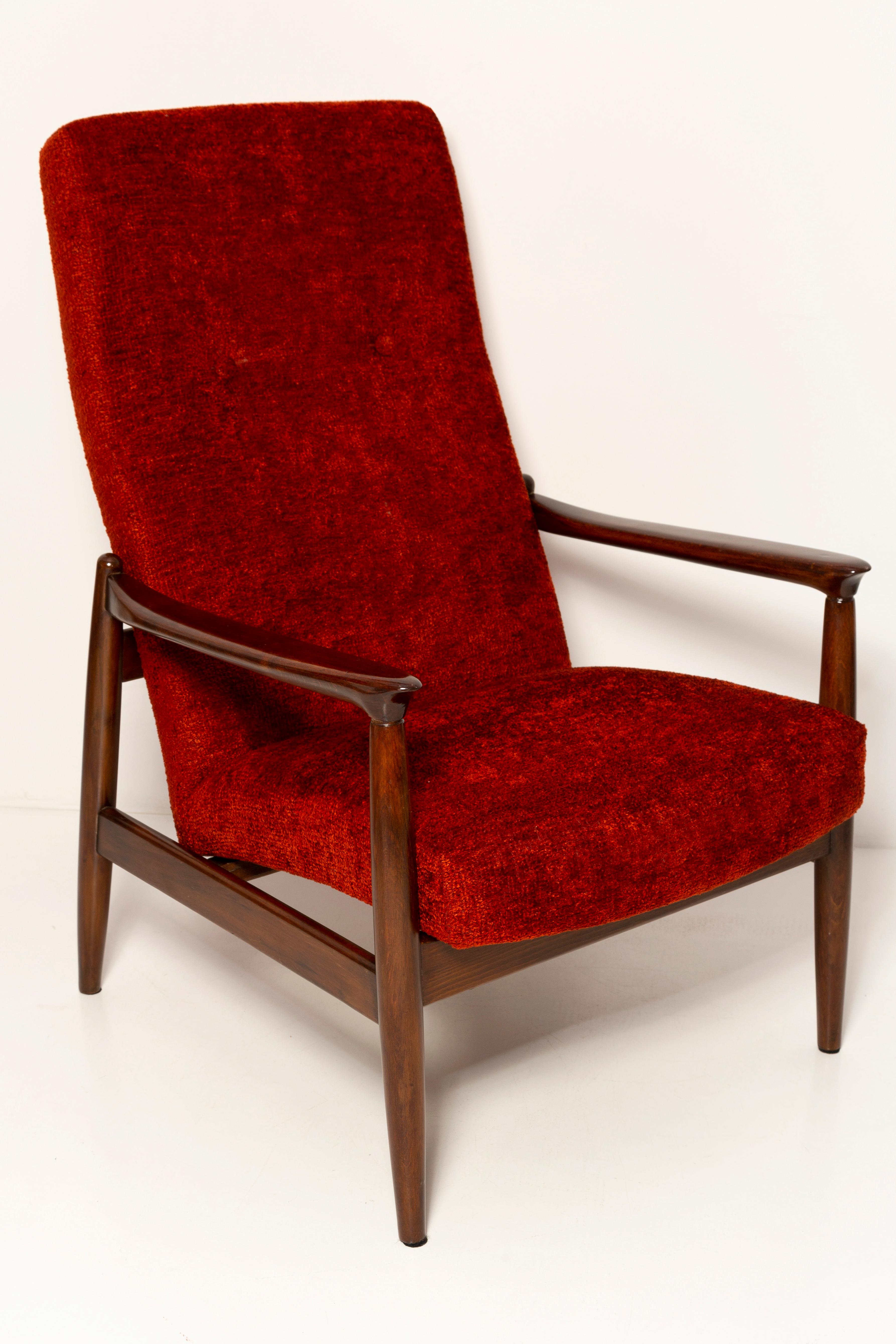 Dark red boucle armchair designed by Edmund Homa, a Polish architect, designer of Industrial Design and interior architecture, professor at the Academy of Fine Arts in Gdansk.

The armchairs were made in the 1960s in the Gosciecinska Furniture
