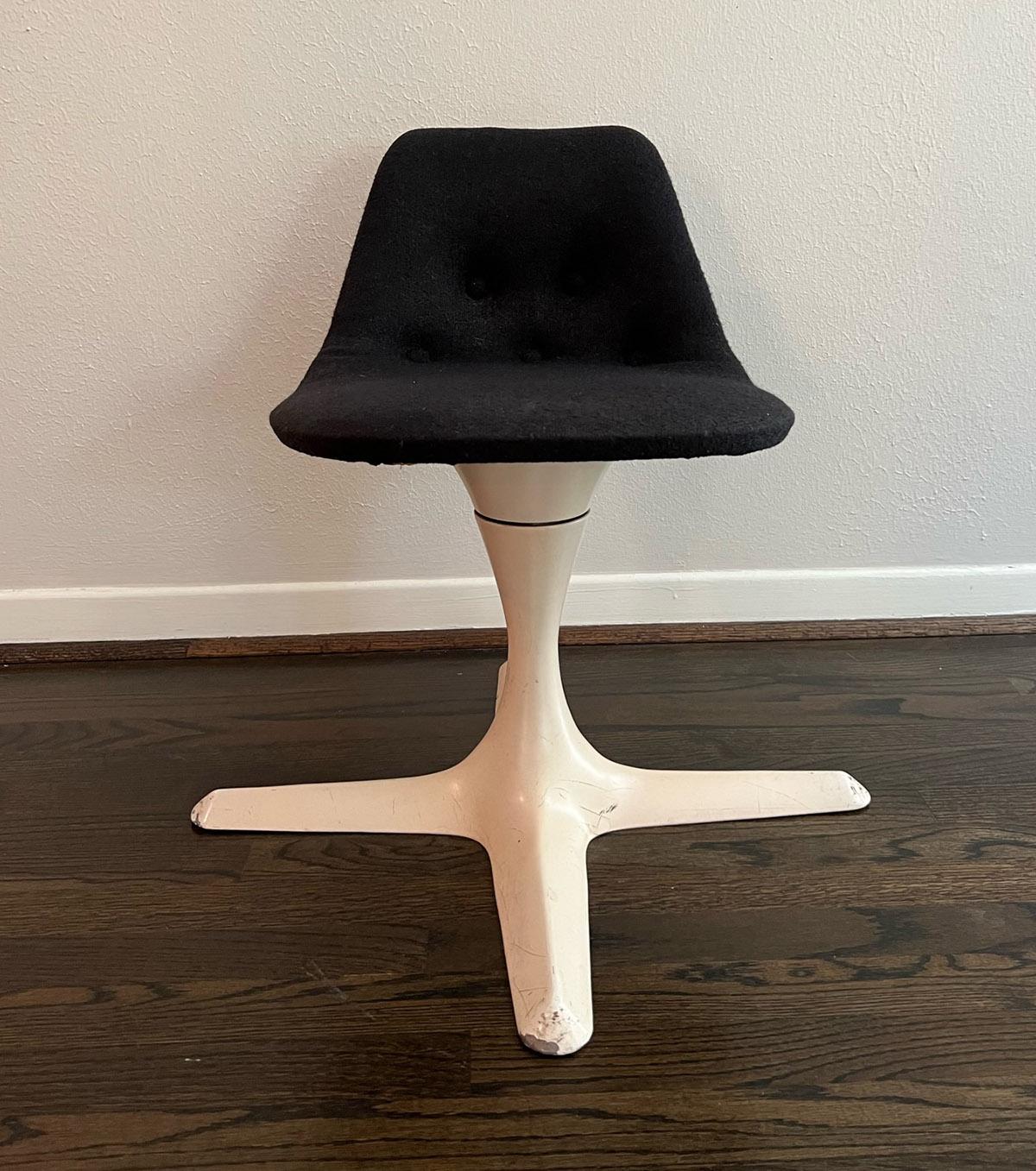 By Burke of Dallas Texas, iconic design and first cousin to Saarinen's tulip chairs. Starburst base with original button tufted upholstery. 
Details
Dimensions
Height: 31in 
Width: 20 in. 
Depth: 20 in.