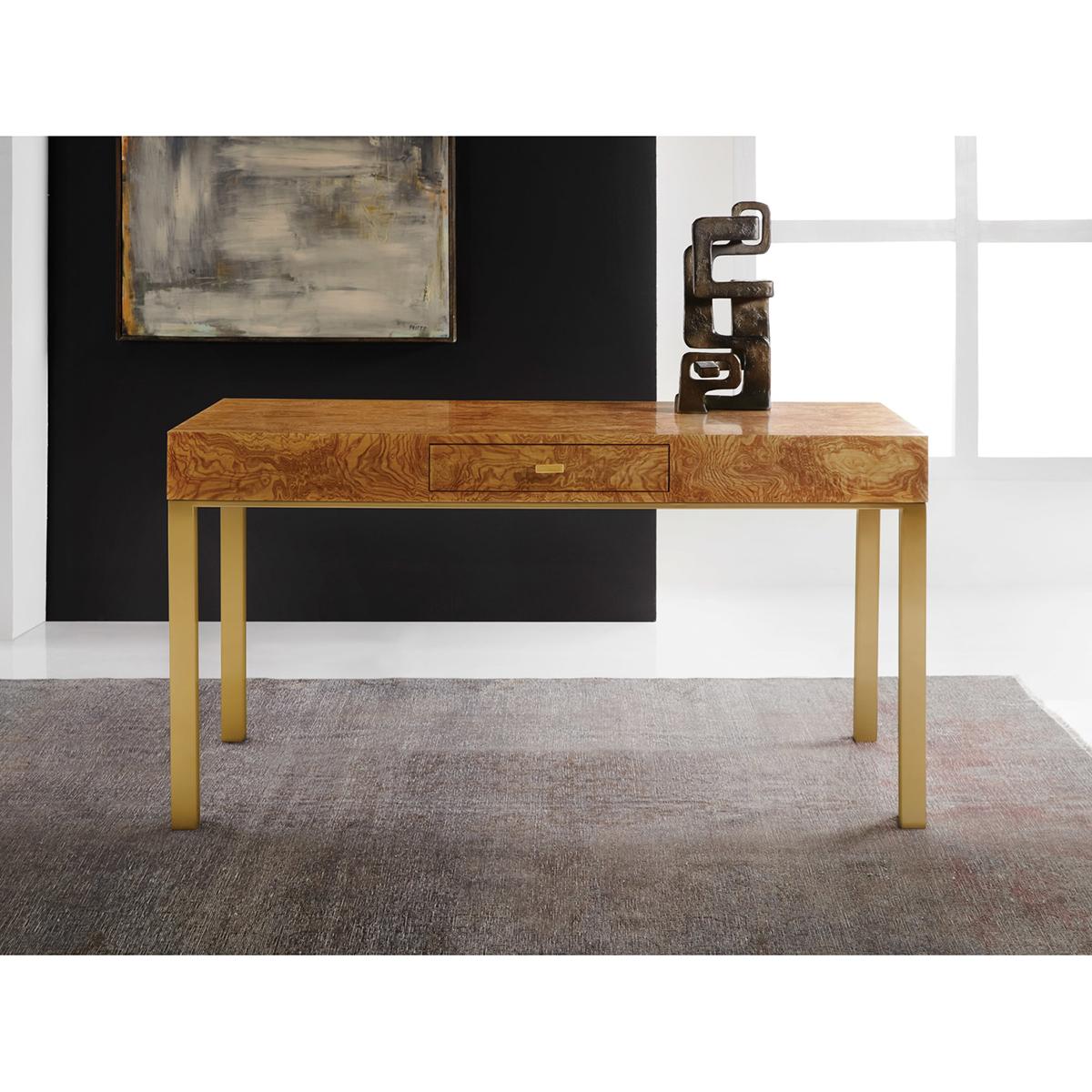 Midcentury Burl Desk with an exotic Olive Ash burl veneer top, with a solid oak working pencil drawer and raised on a brass finished modern four straight leg base. 

Dimensions: 60