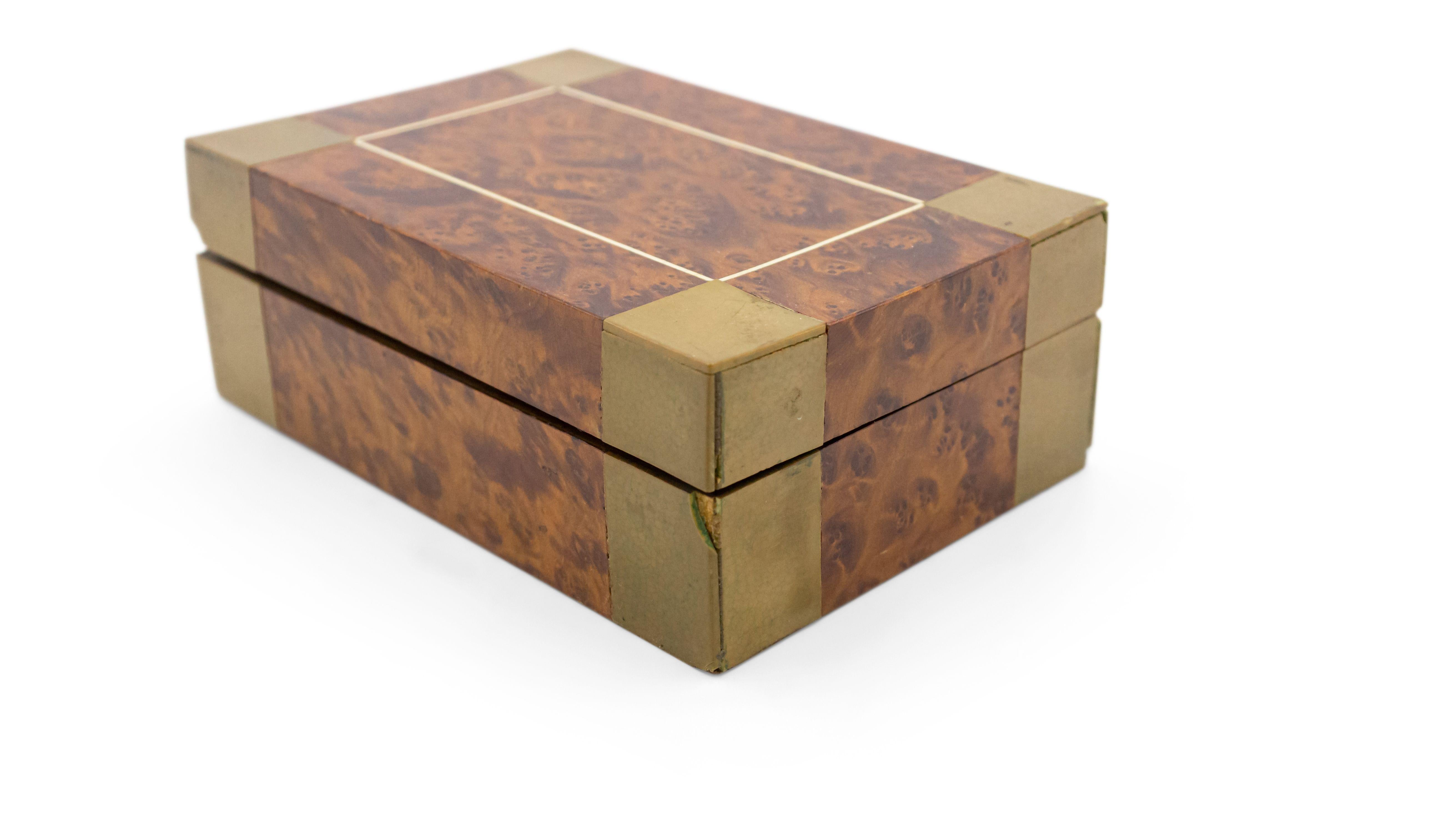 Mid-century rectangular burl wood box with beige plastic corners.
      