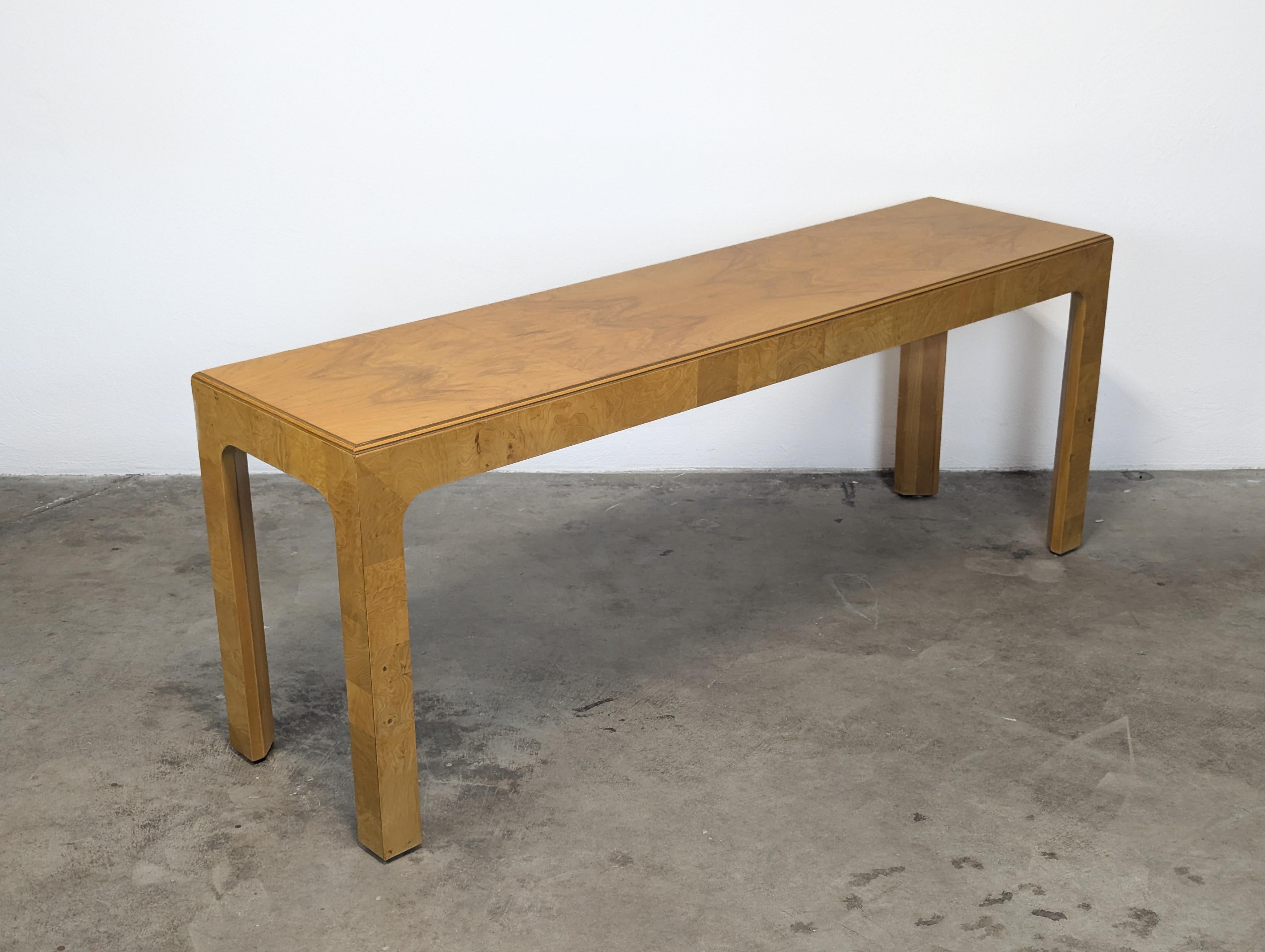 Presenting a stunning Mid Century Burled Olive Parsons Console Sofa Table by the renowned Henredon, Scene Two, circa 1970s. This exquisite piece embodies the elegance and sophistication of mid-century design, featuring a luxurious burl wood finish