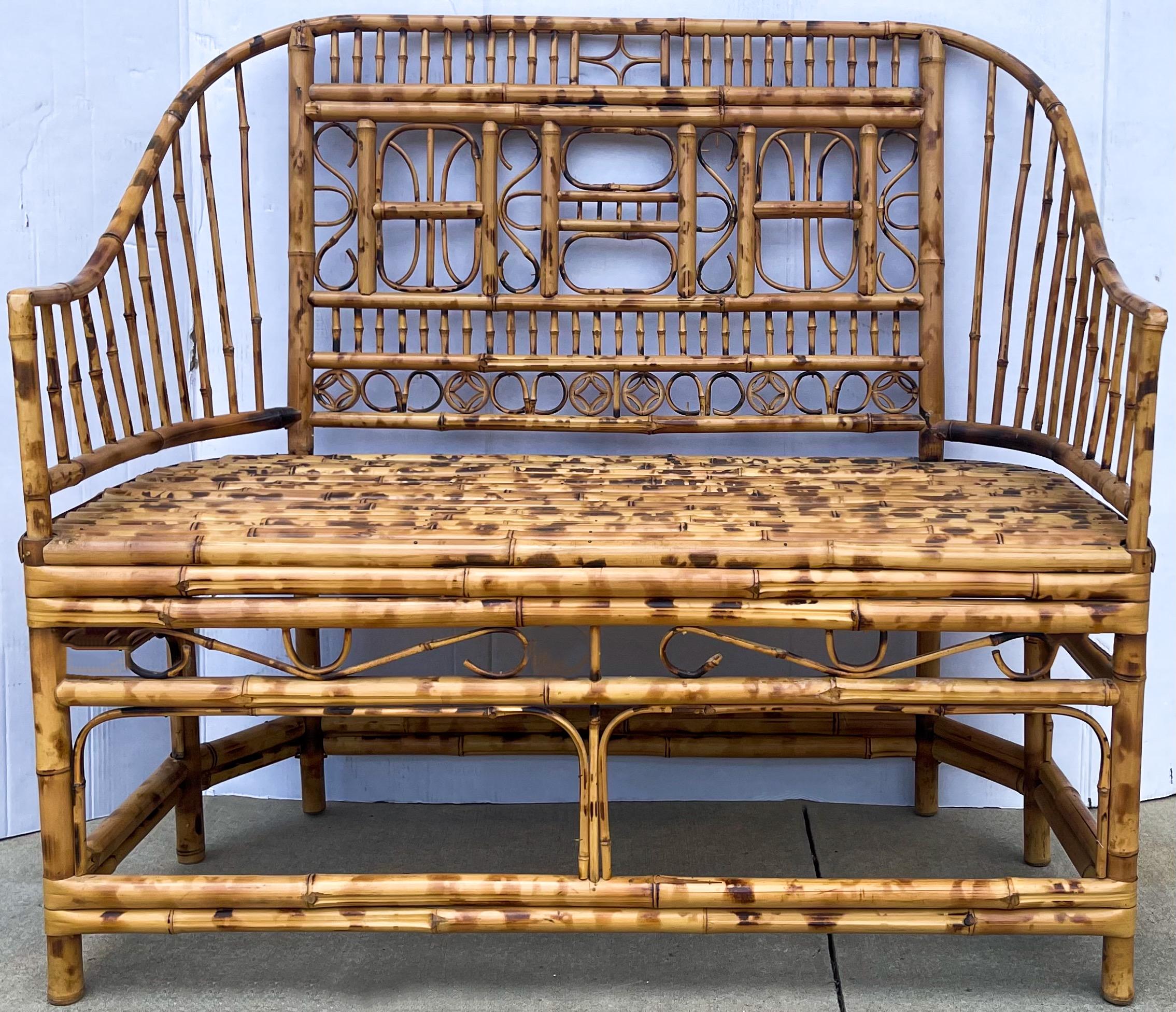 A rare bird! This is a English Brighton Pavilion style burnt bamboo settee. I believe it was probably crafted in China, but it is unmarked. It is actually in very nice vintage condition.

My shipping is only for the Continental US.