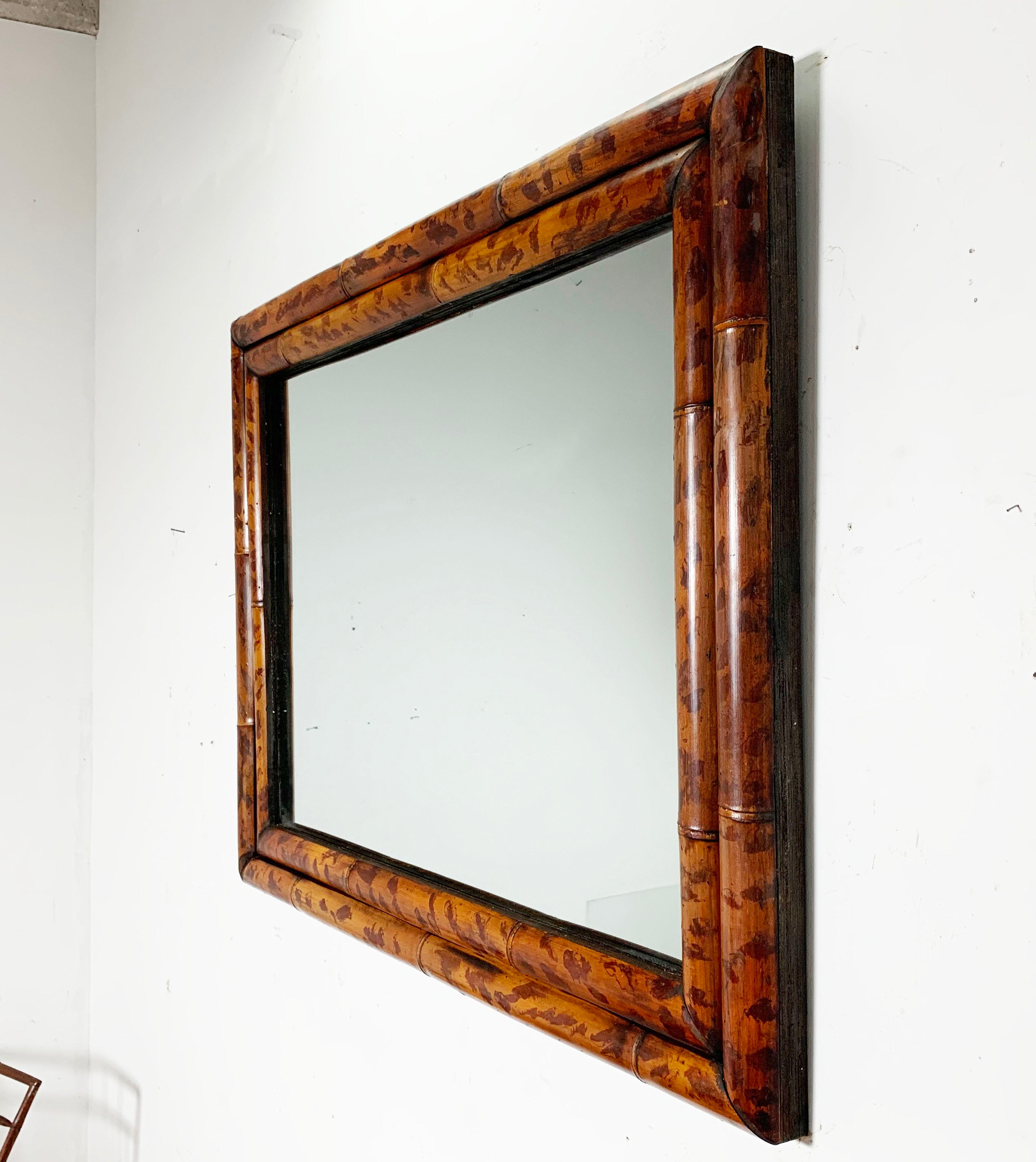 Wall or mantel mirror consisting of double burnt bamboo frameworks, circa 1970s.