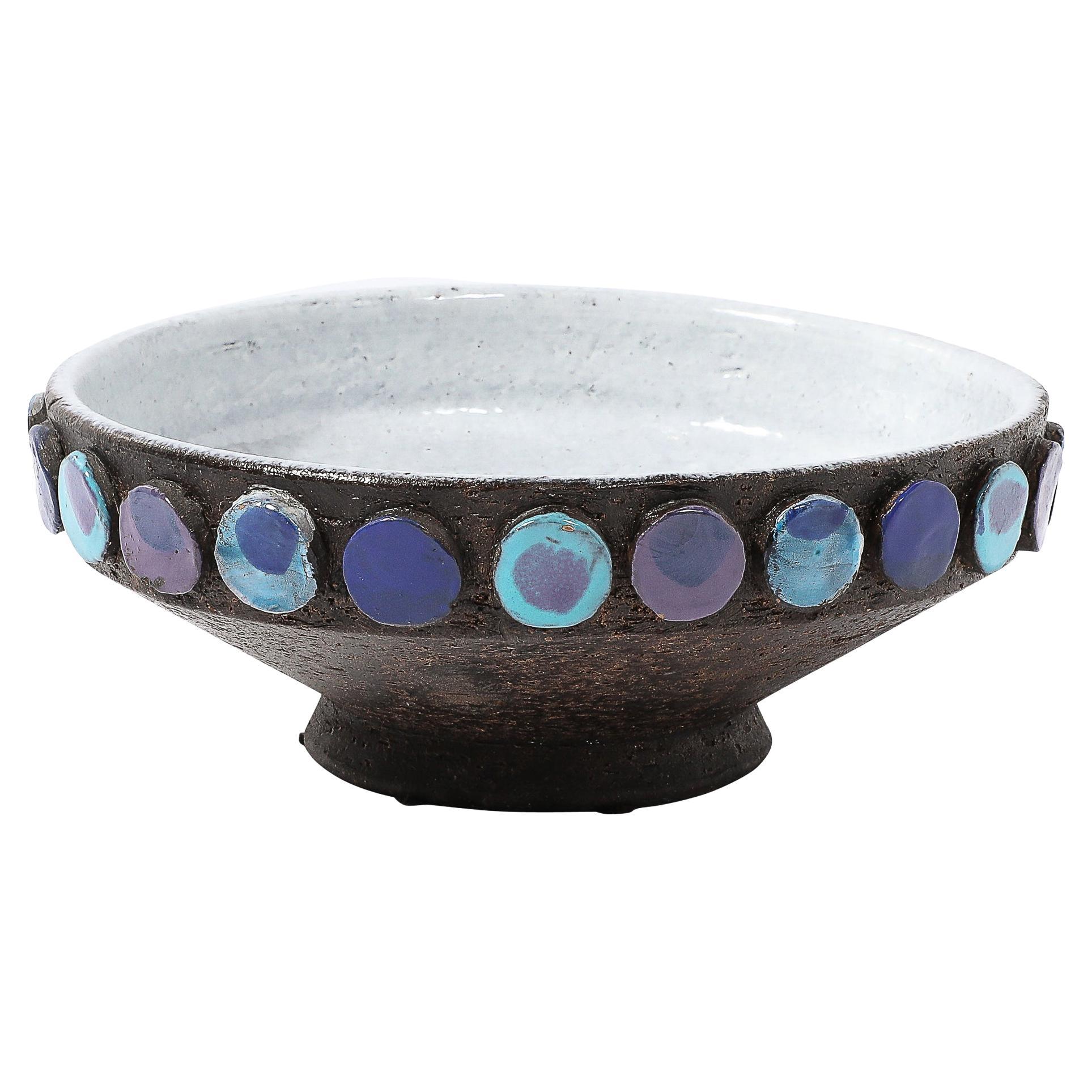 Ciotola in ceramica blu multicolore di Aldo Londi per Vistosi, risalente alla metà del secolo scorso.