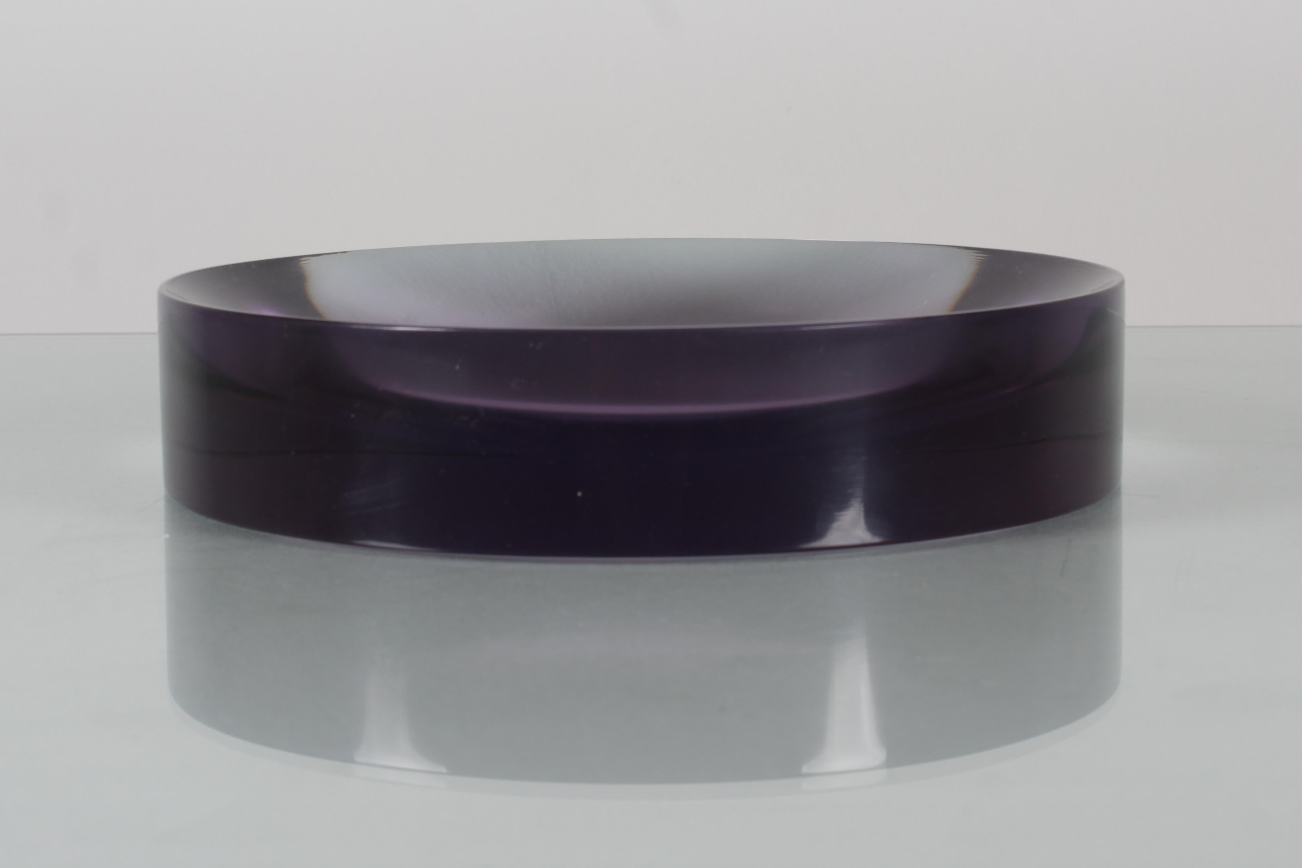Very refined circular pocket emptier in solid purple Murano glass. Visible a very small chips on the edge of the base. Murano production by Carlo Nason, Italy 60s.