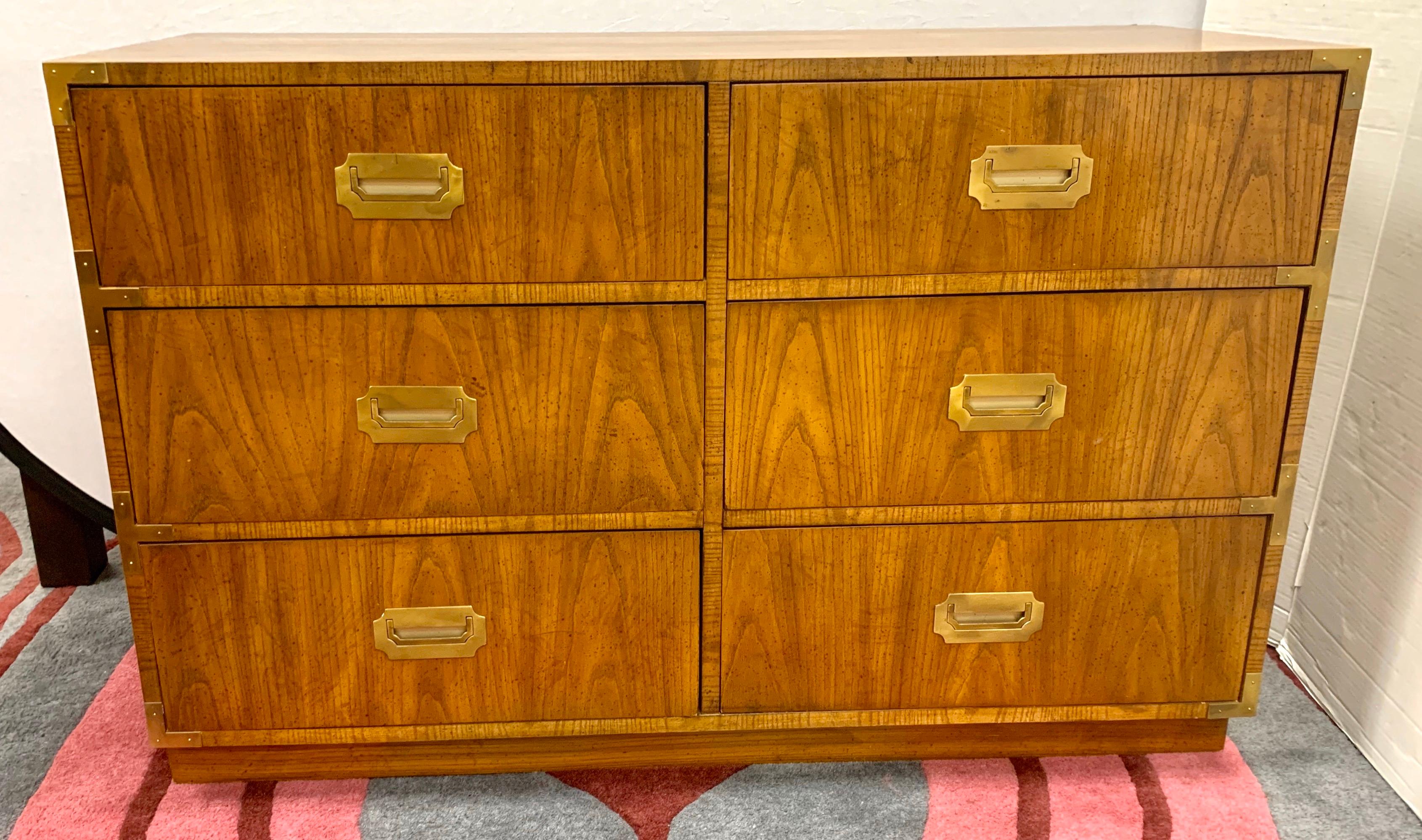 Coveted campaign style two piece writing desk with dresser chest of drawers. Make is Dixie and style is the Campaigner. Made in USA, circa 1960s-1970s.