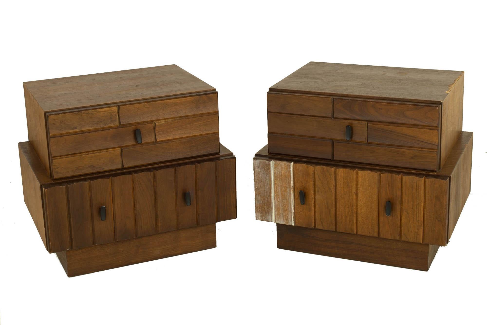 Mid century canadian Brutalist walnut nightstands - pair

These nightstands measure: 25 wide x 19 deep x 22 inches high

?All pieces of furniture can be had in what we call restored vintage condition. That means the piece is restored upon