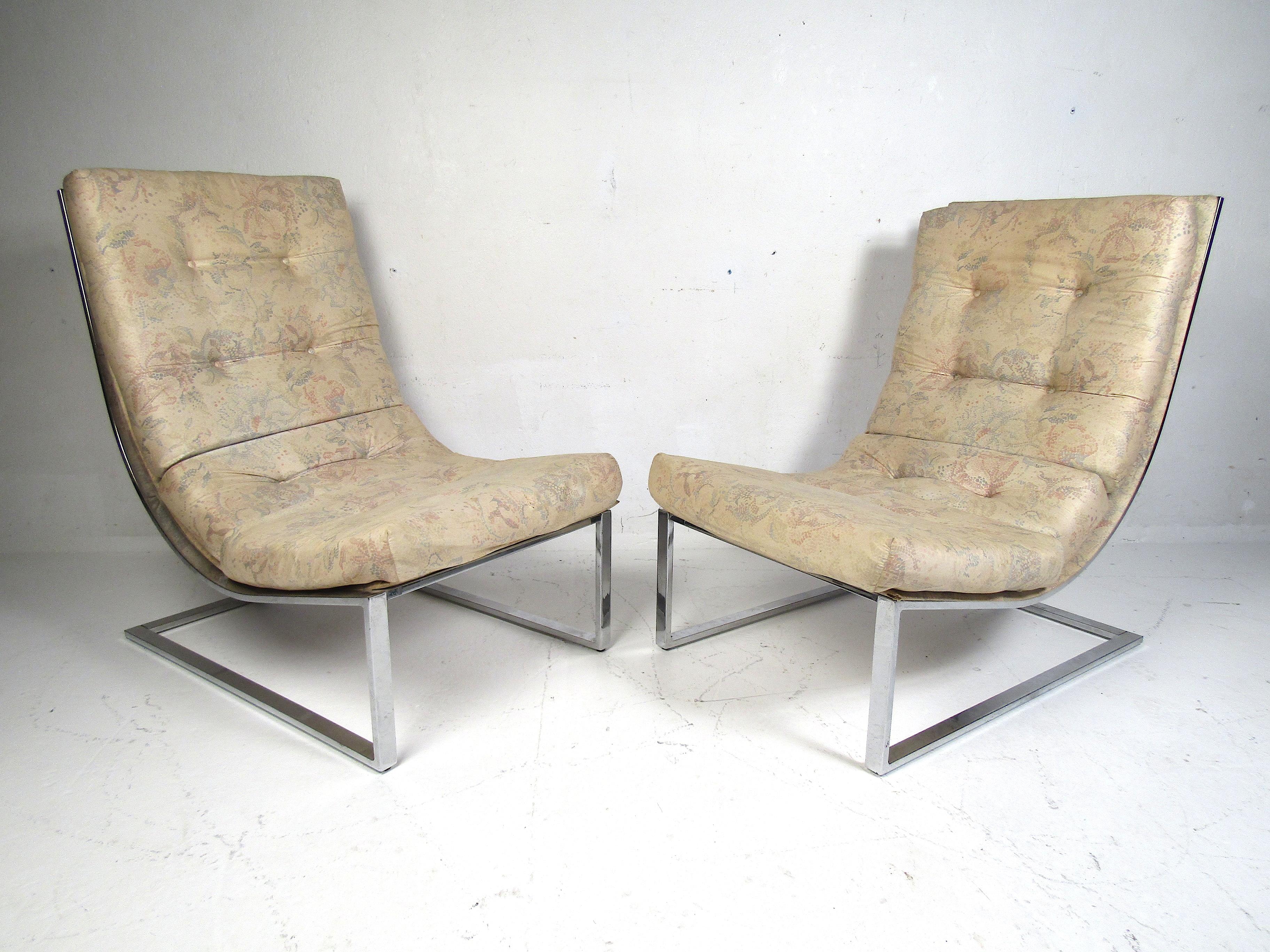 Stylish pair of midcentury lounge 