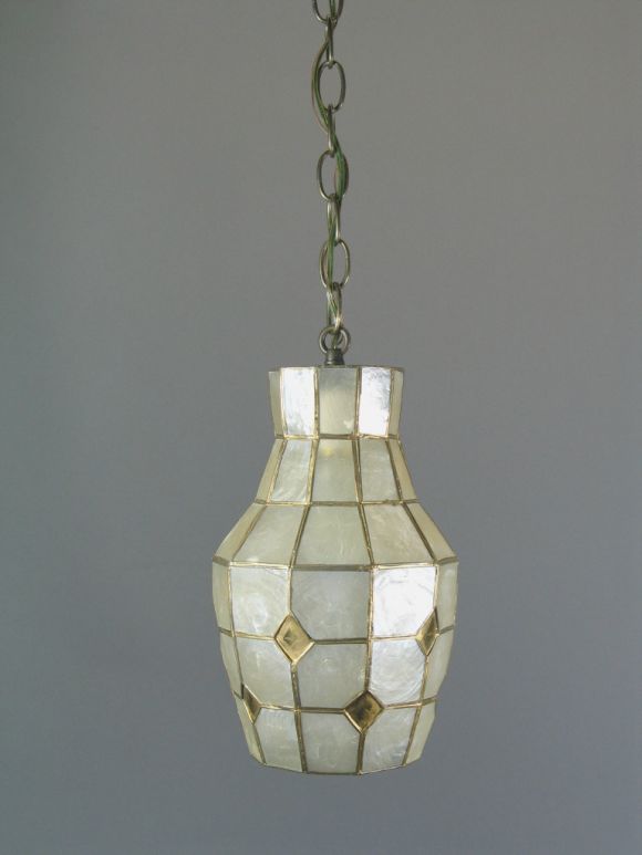 #1-1618 Handmade Capiz shell lanterns
Takes one 100watt Edison based bulb.