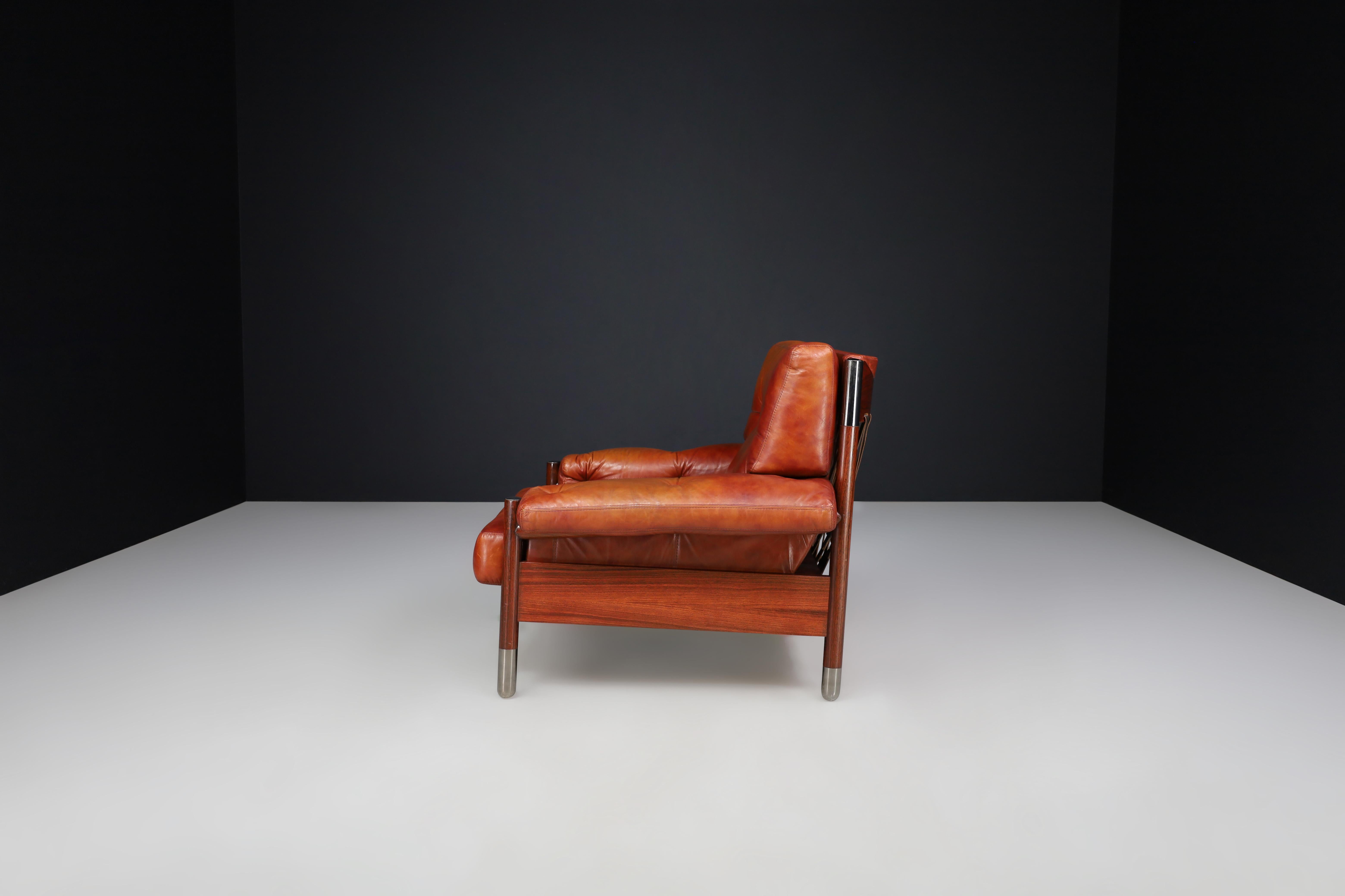 Mid-Century Carlo de Carli Leather lounge chair and ottoman, Italy 1970s For Sale 7