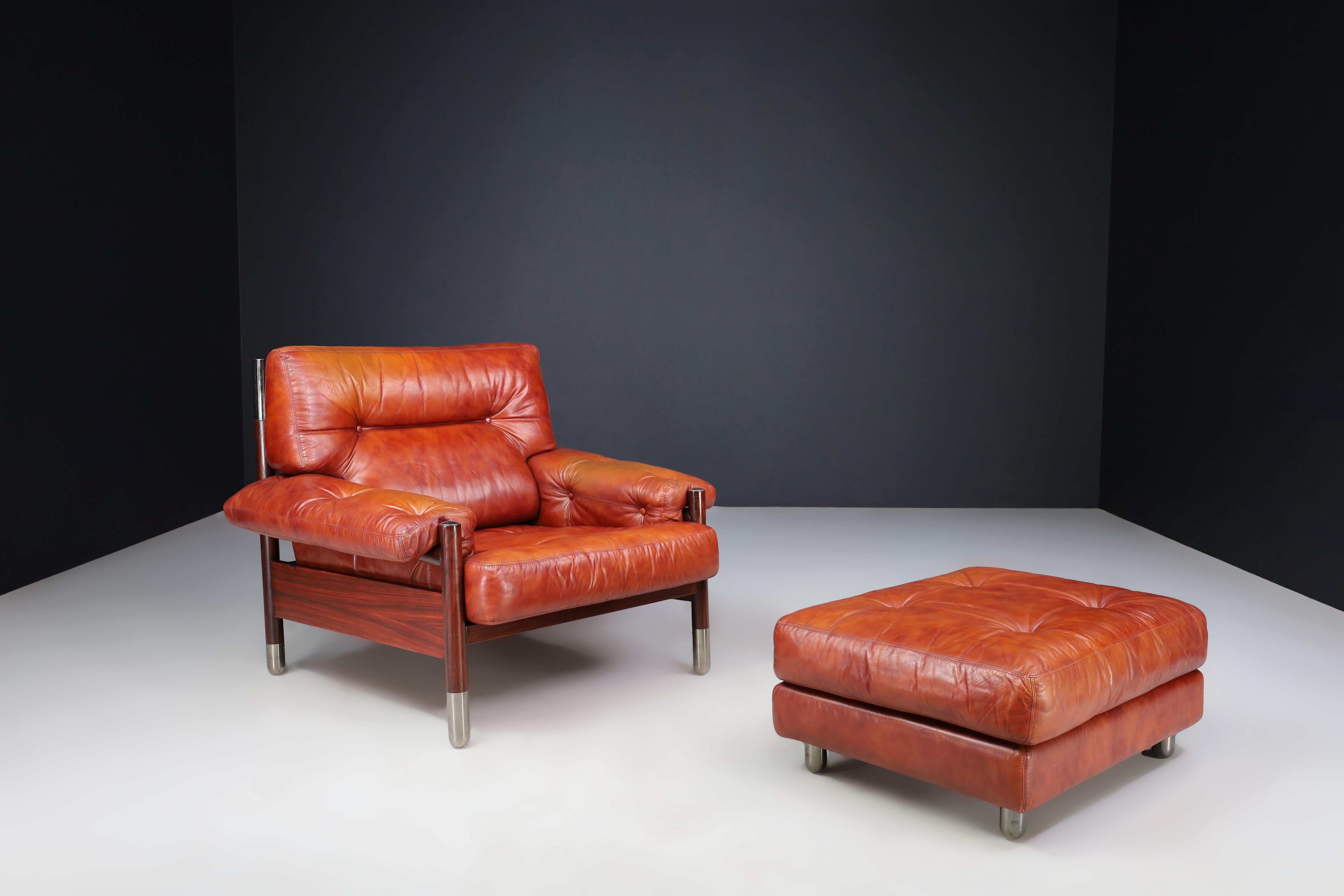 Mid-Century Carlo de Carli Leather lounge chair and ottoman, Italy 1970s For Sale 9