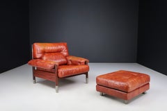Mid-Century Carlo de Carli Leather lounge chair and ottoman, Italy 1970s