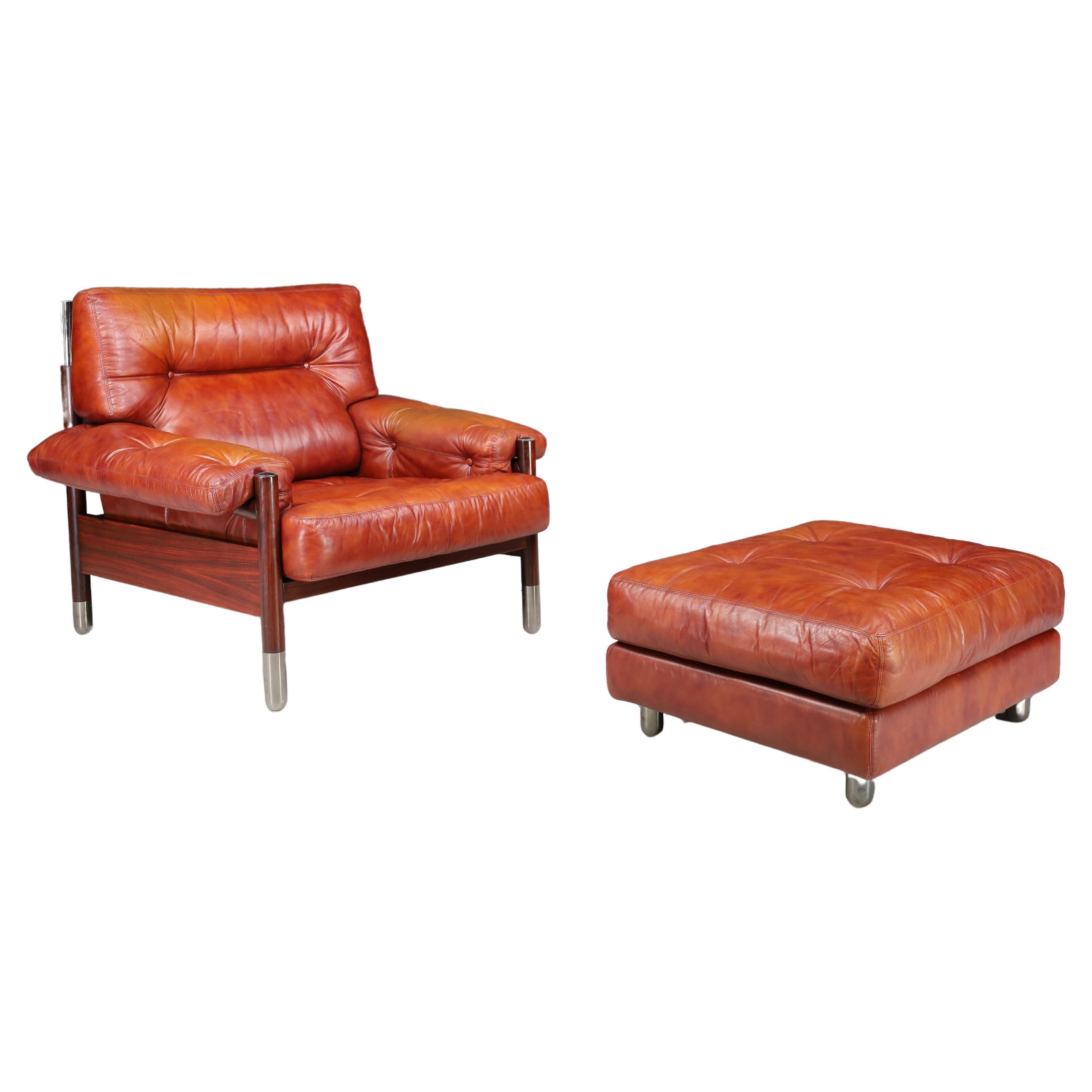 Mid-Century Carlo de Carli Leather lounge chair and ottoman, Italy 1970s