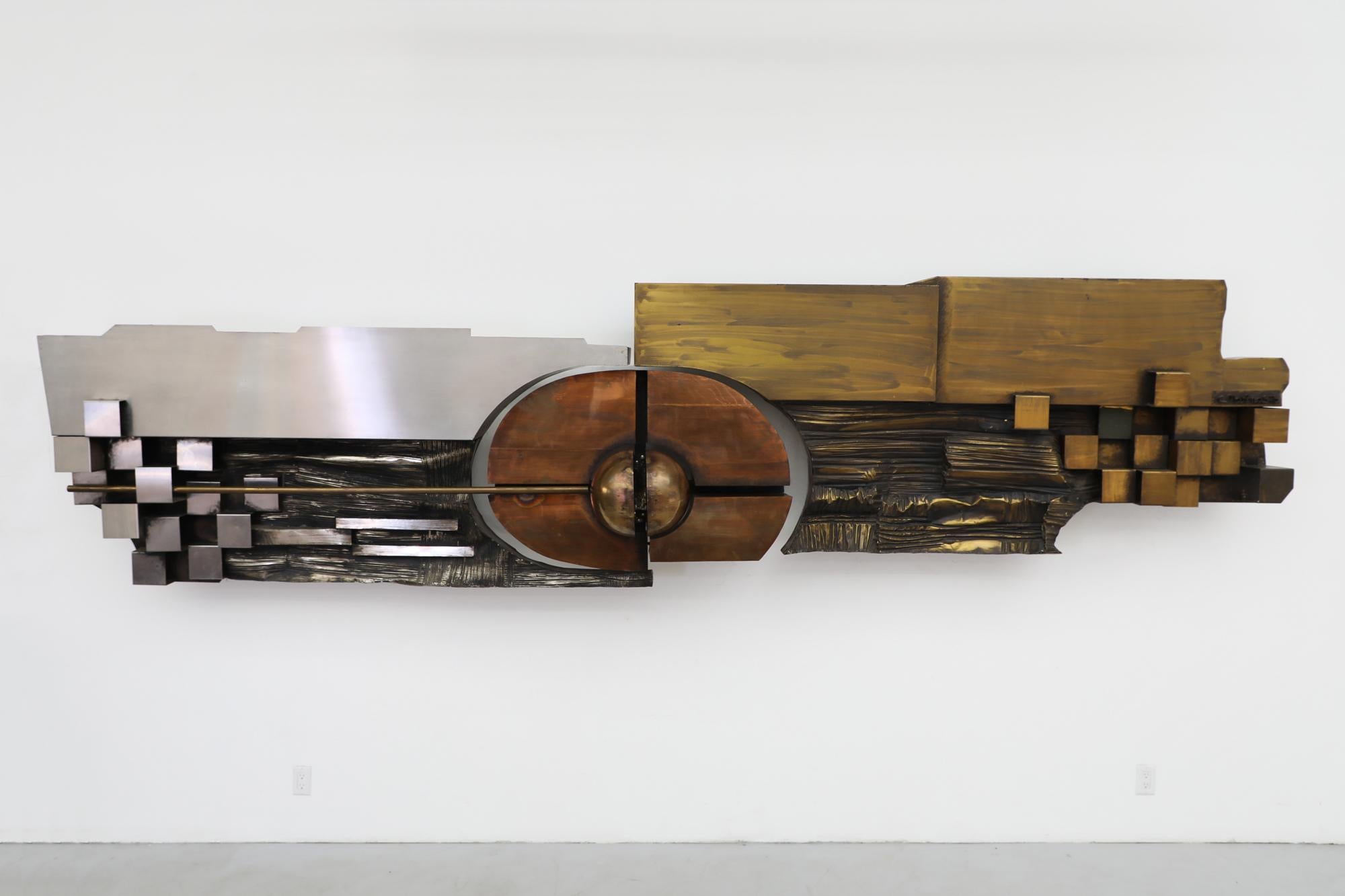 Extra large copper, brass and steel Brutalist wall mounted sculpture by Carlos Marinas Rubio, 1975. Marinas Rubio made this piece for the Telefonica building in Madrid, Spain. This piece is mounted on separate pieces and attached to the wall. In