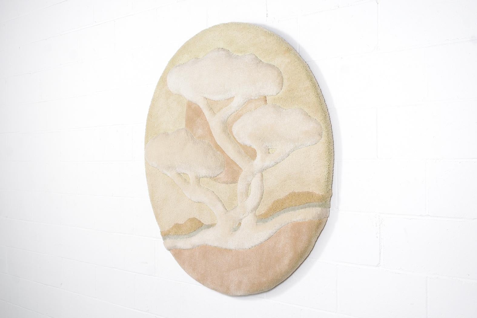 Dive into the 1970s allure with our stunning Mid-Century Modern Circular Vintage Sculpture. Perfectly preserved, this wooden masterpiece boasts a handcrafted tapestry, portraying a serene bonsai tree bathed in sunset hues. Its light color palette