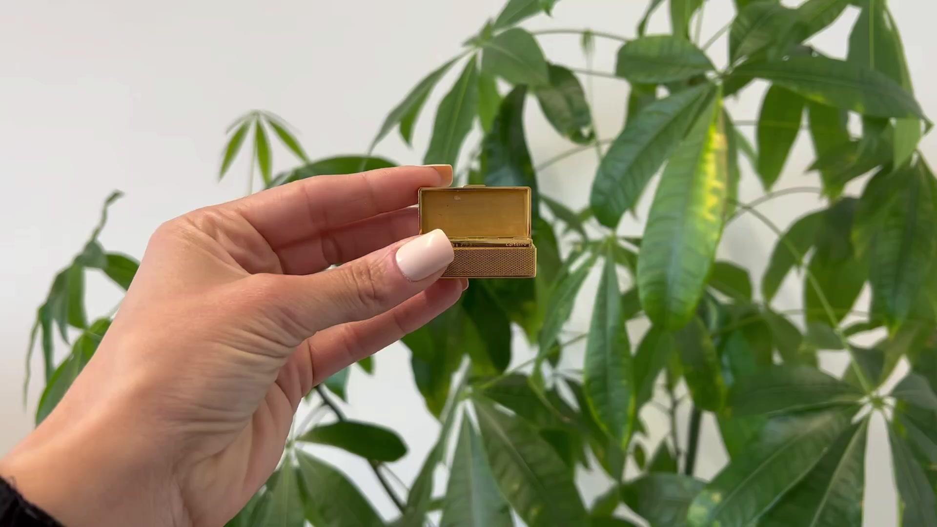 One Mid Century Cartier Italy 18k Yellow Gold Pill Box. Crafted in 18 karat yellow gold signed Cartier Italy serial #15273 with purity marks, weighing 32.00 grams. Circa 1950. The box is 1 ½ inch in length by ¾ inch in width. 

About this Item: