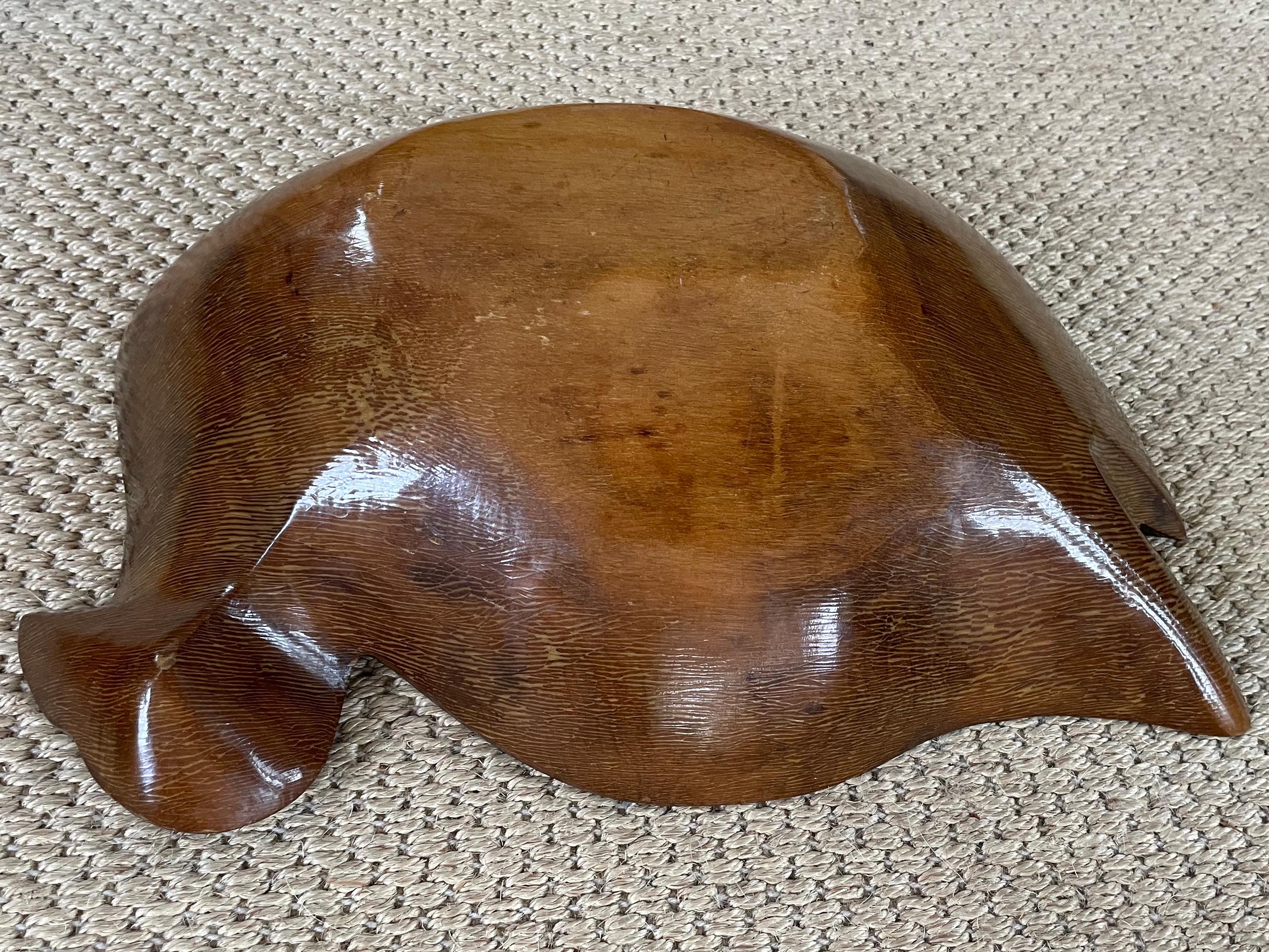 Mid-century carved bird bowl sculpture. Vintage carved from one piece of wood serving bowl / dough bowl / sculpture in the form of large fowl. Perfect for your Thanksgiving celebrations. United States, Mid-20th Century. 
Dimensions: 17