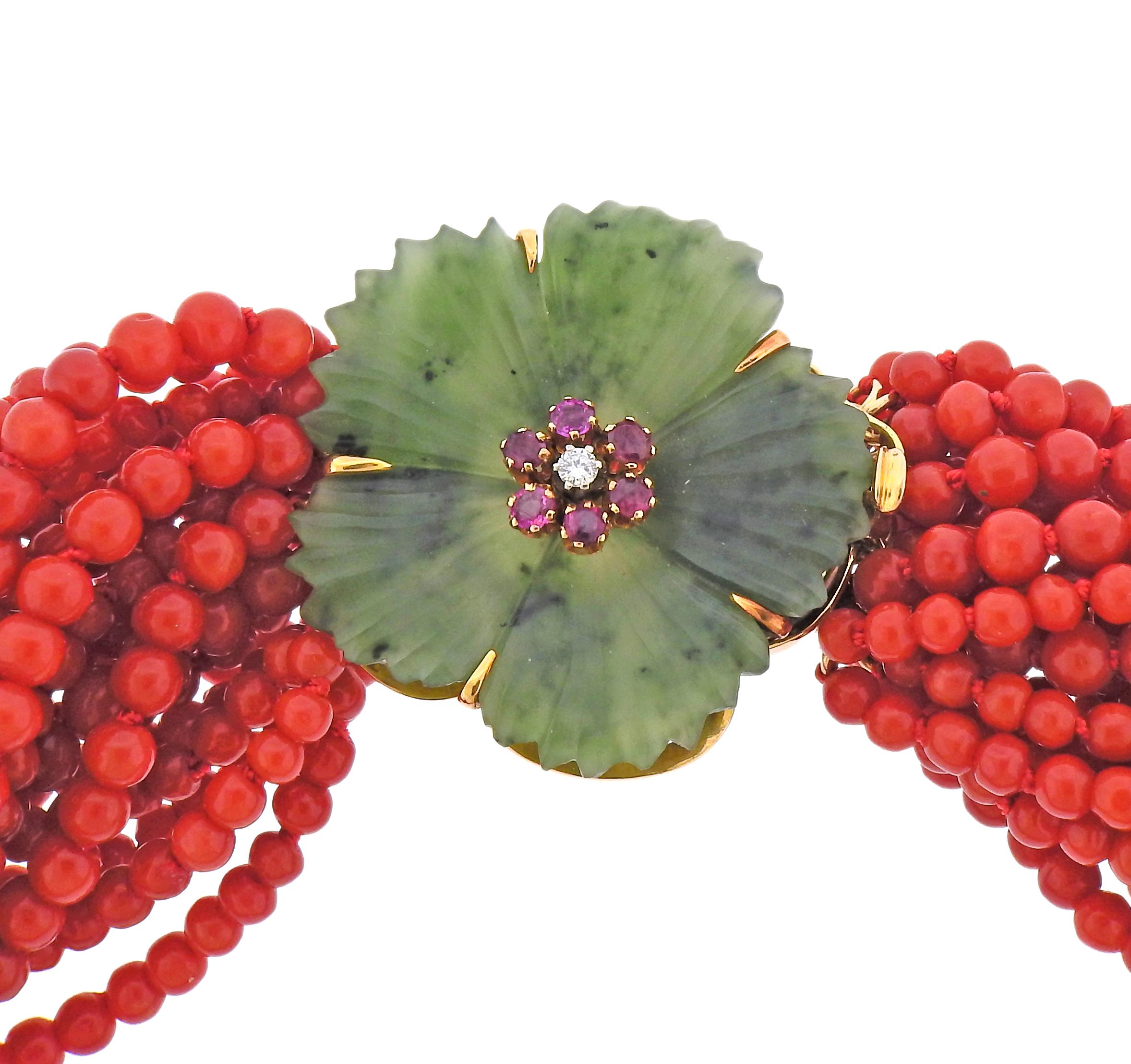 Mid century 18k gold flower clasp torsade necklace, featuring carved nephrite flower, with rubies and approx. 0.05ct diamond, and coral beads 3.3 - 4.5mm. Necklace is 15.5