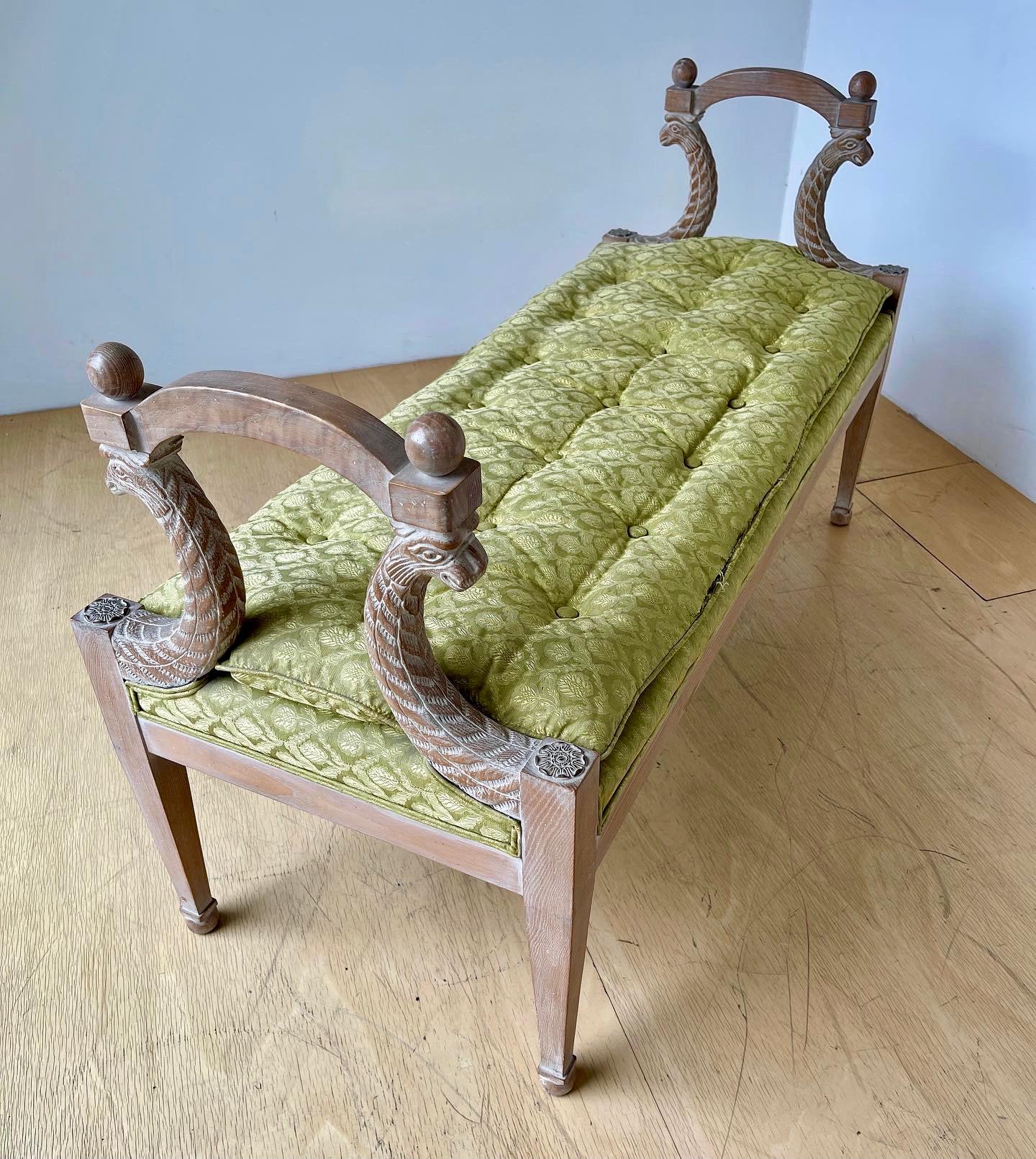 Carved oak bench by Baker Furniture Company. Perfect for the end of a bed. Wood is detailed beautifully and in strong and sturdy condition but upholstery fabric is original and in rough shape - so you'll want to hand it over to your upholsterer with