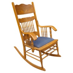 Mid-Century Carved Oak Press Back and Upholstered Seat Rocker Chair