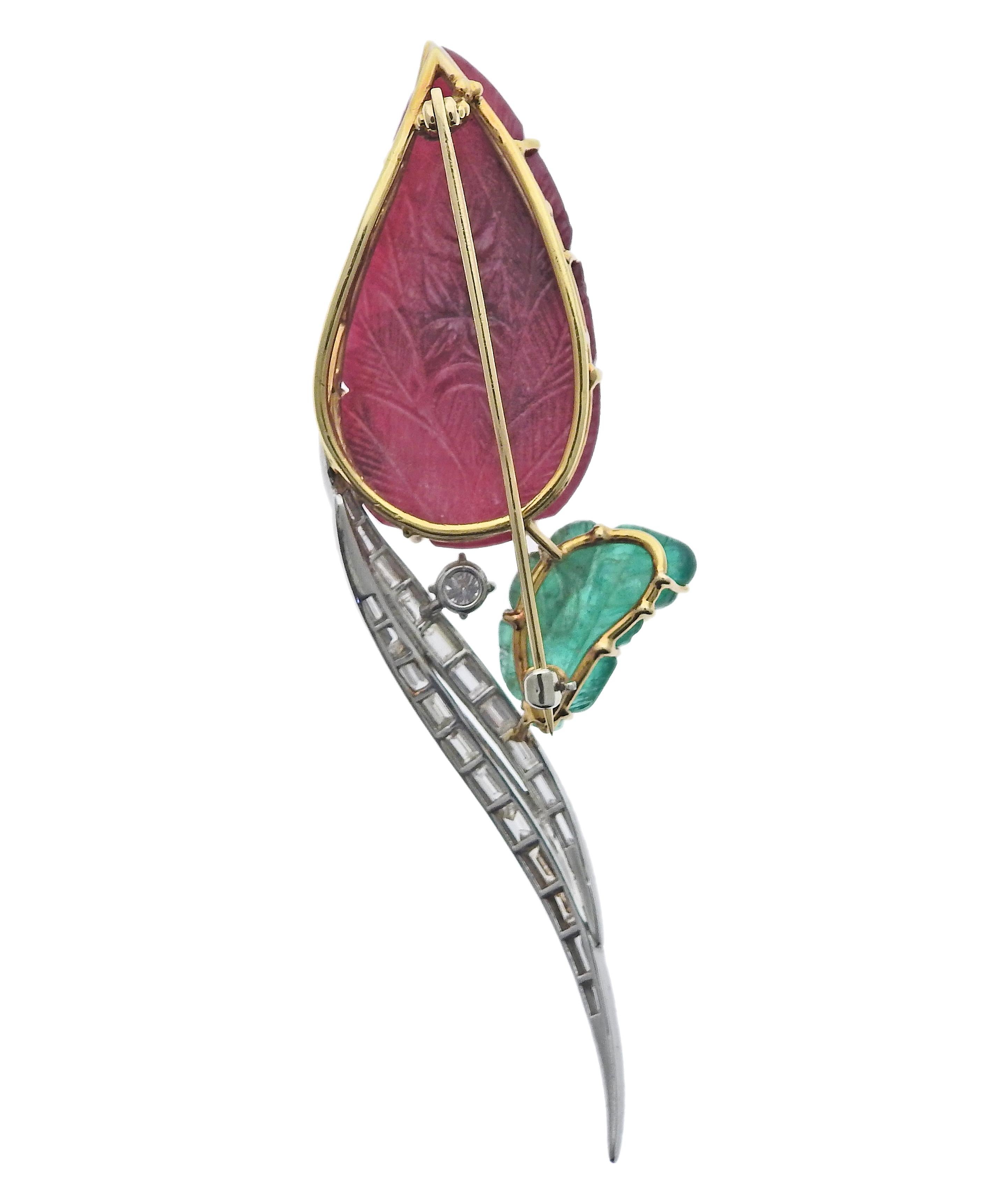 18K yellow and white gold brooch, set with carved ruby, emerald and 1.10ctw in SI/H diamonds. Brooch measures 86mm x 30mm. Marked/Tested: 18k. Weight is 25.2 grams. 