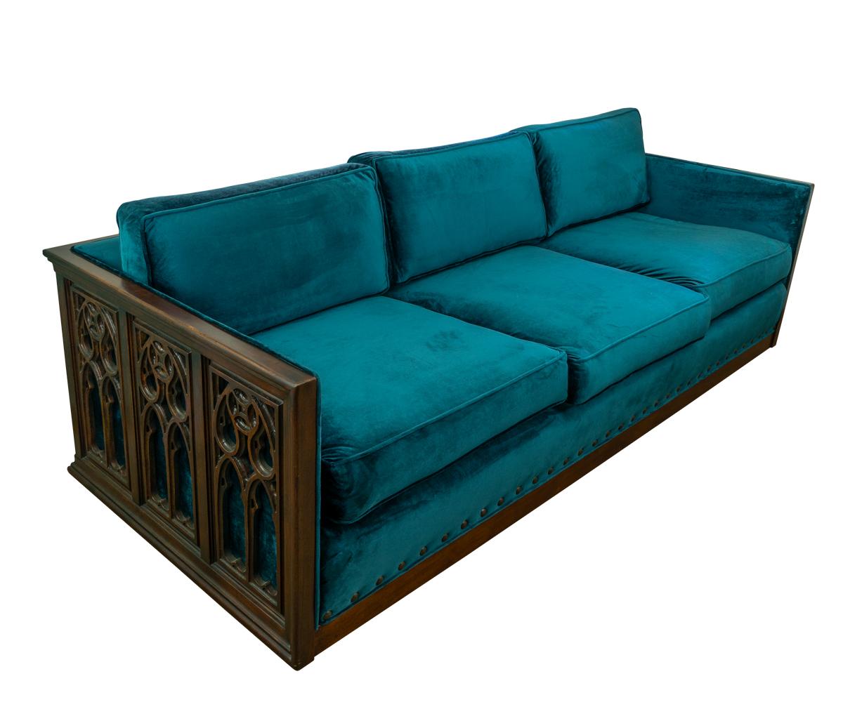 Offered is this very rare hand carved wood Gothic style frame comfortable sofa. This three-seat modern style sofa has been reupholstered with beautiful soft blue velvet fabric.