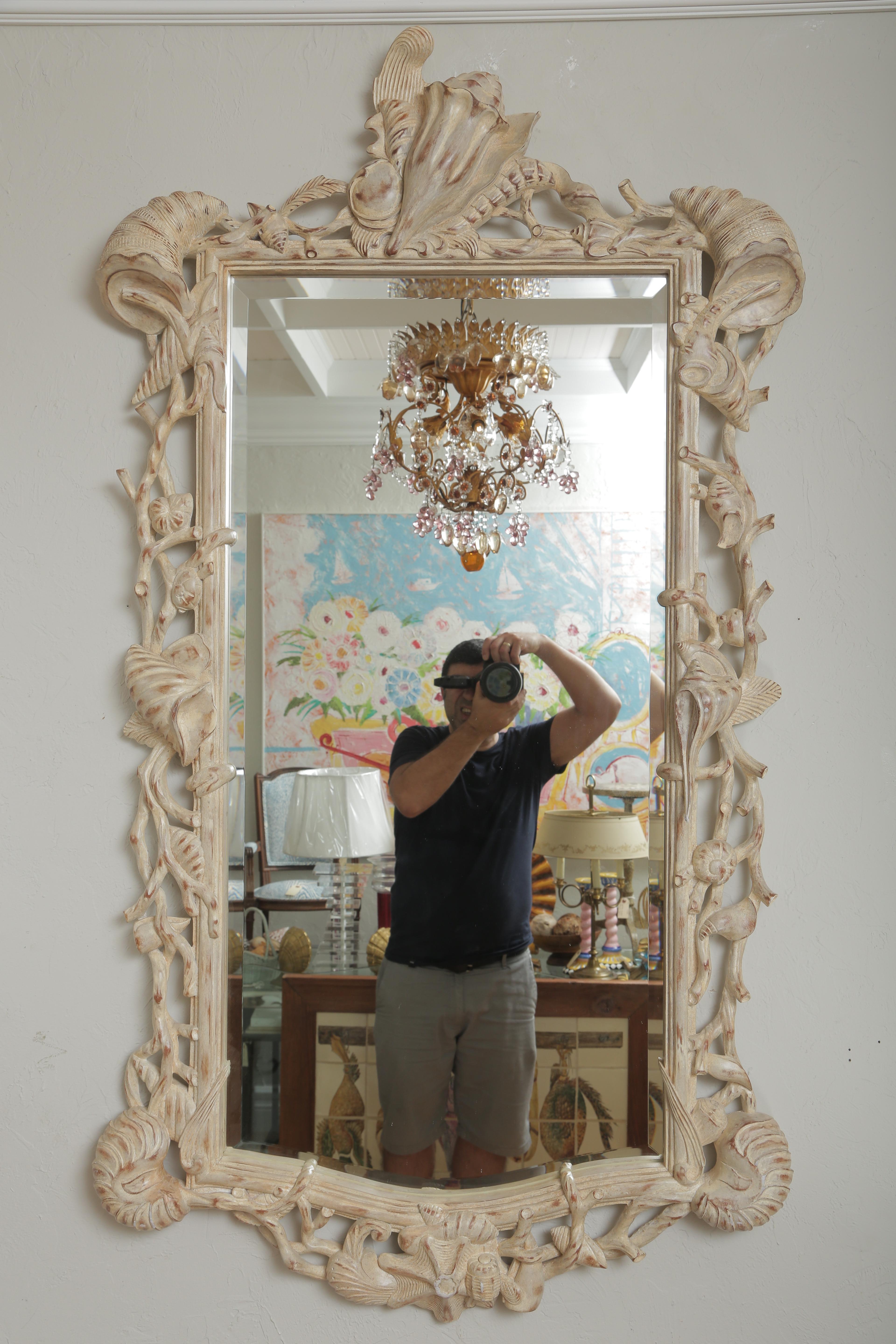 Large Carved wood midcentury shell mirror.