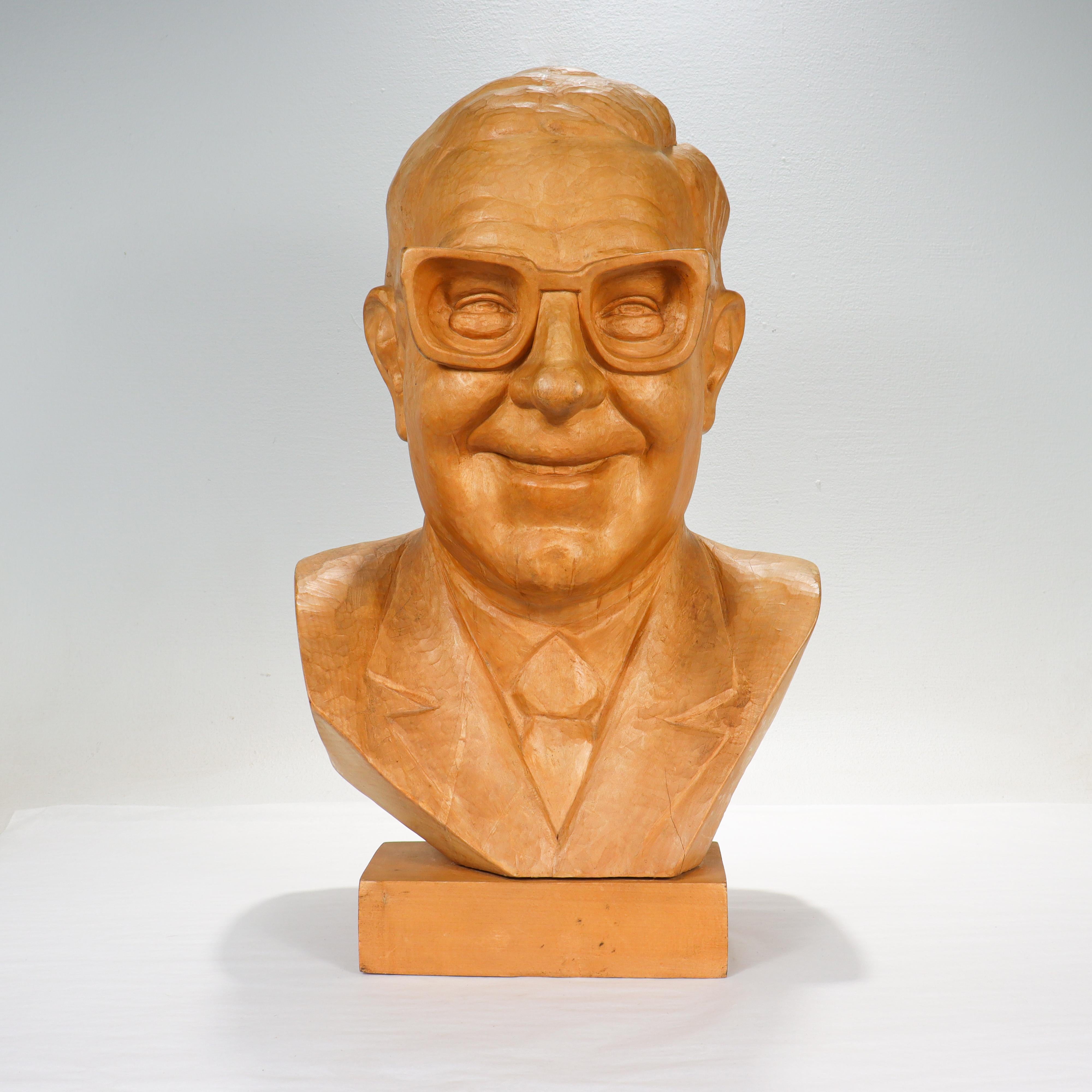 A fine large mid-century wooden bust.

By Theodora Stasiak of Krakow, Poland.

The bust is in the form of a smiling, amazingly bespectacled man wearing a suit and tie. 

Signed T. Stasiak, KR 74 (for Krakow 1974) and stamped with a Polish
