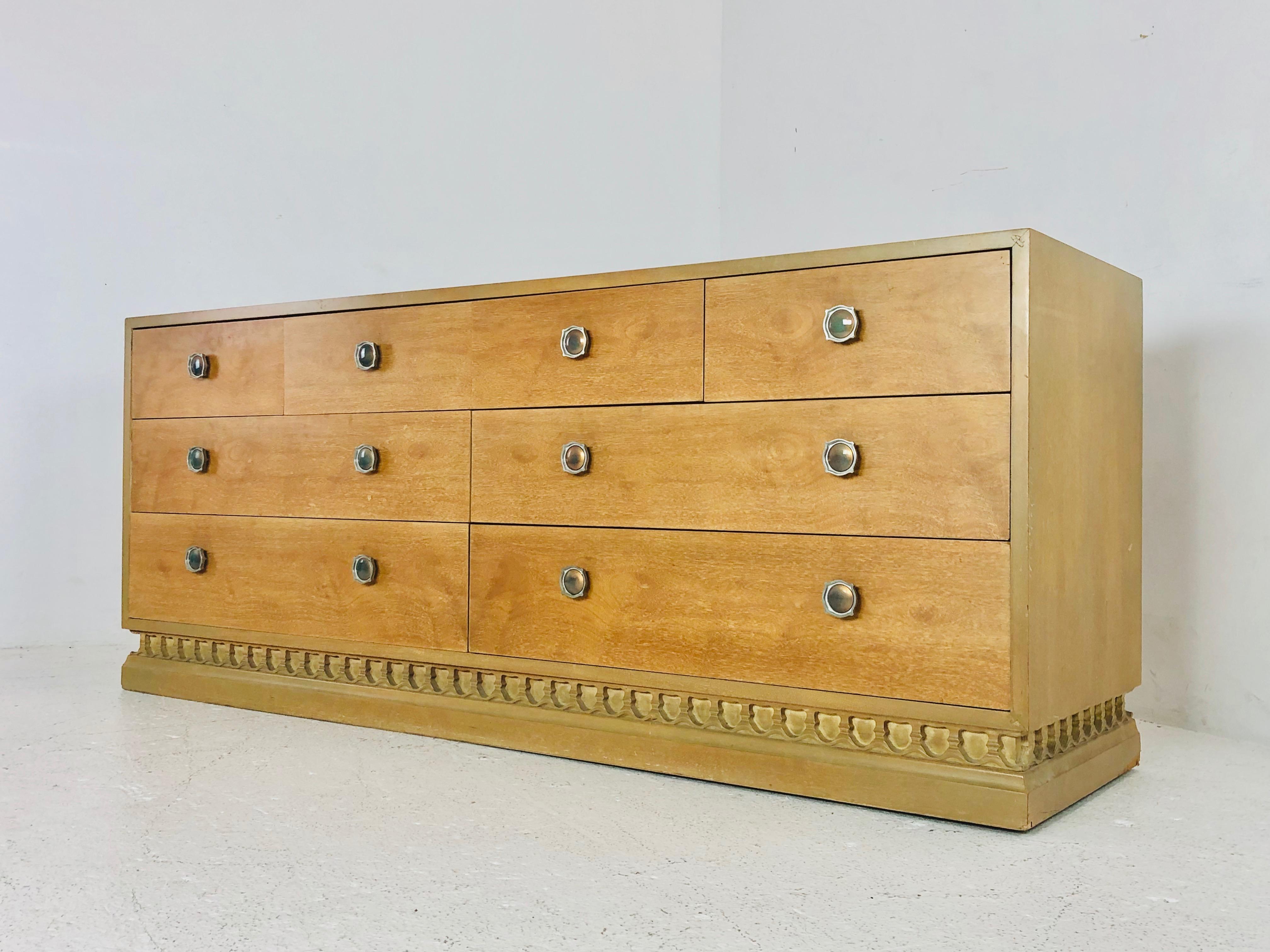 Midcentury casa del sol dresser by Drexel. Dresser is in good vintage condition with veneer loss at base of dresser. Refinishing is recommended.

Dimensions:
72 W x 20 D x 29.5 H.