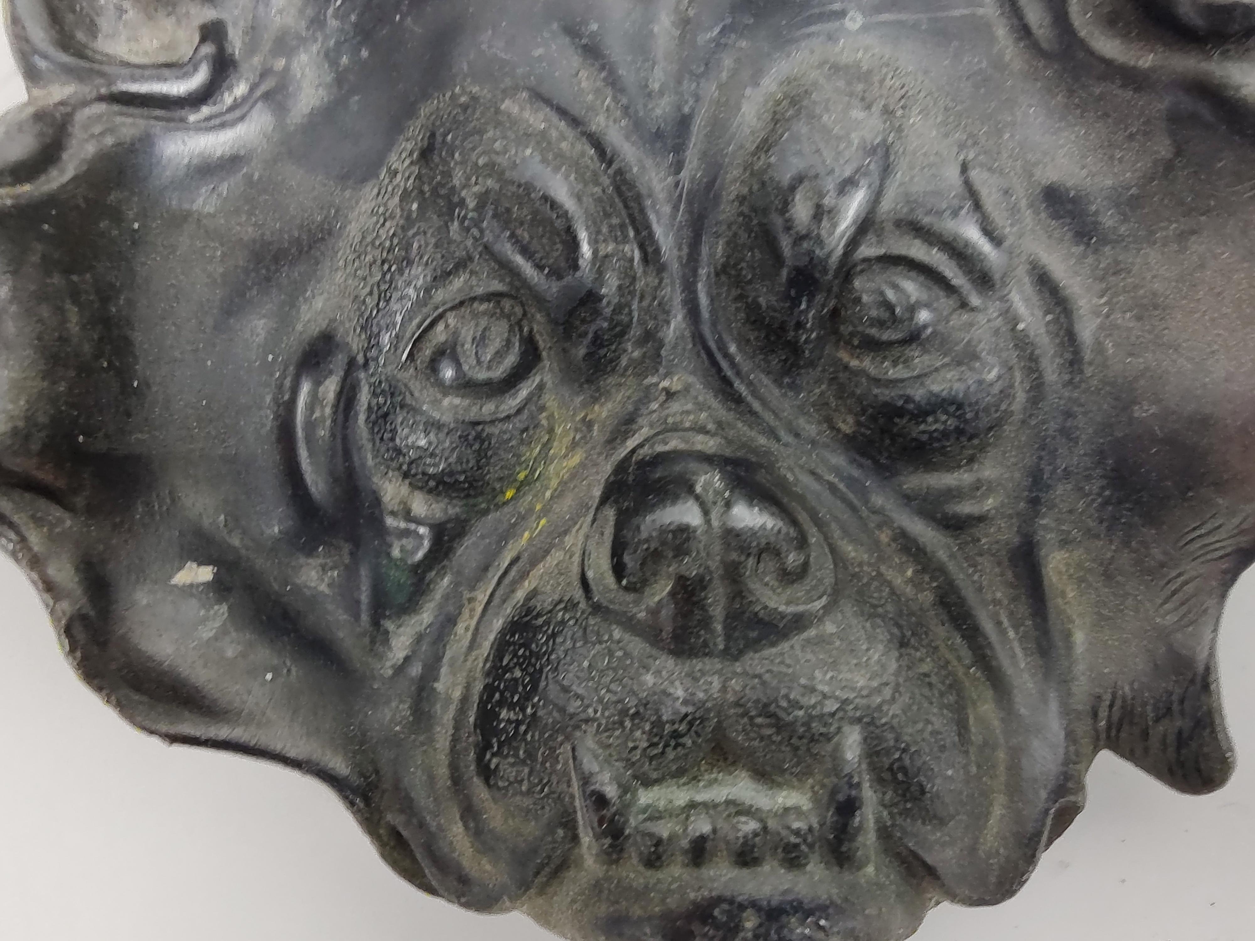 Fabulous and hard to find bulldog face ashtray built to accommodate a cigar. Original Black Paint present. In excellent vintage condition with minimal wear.