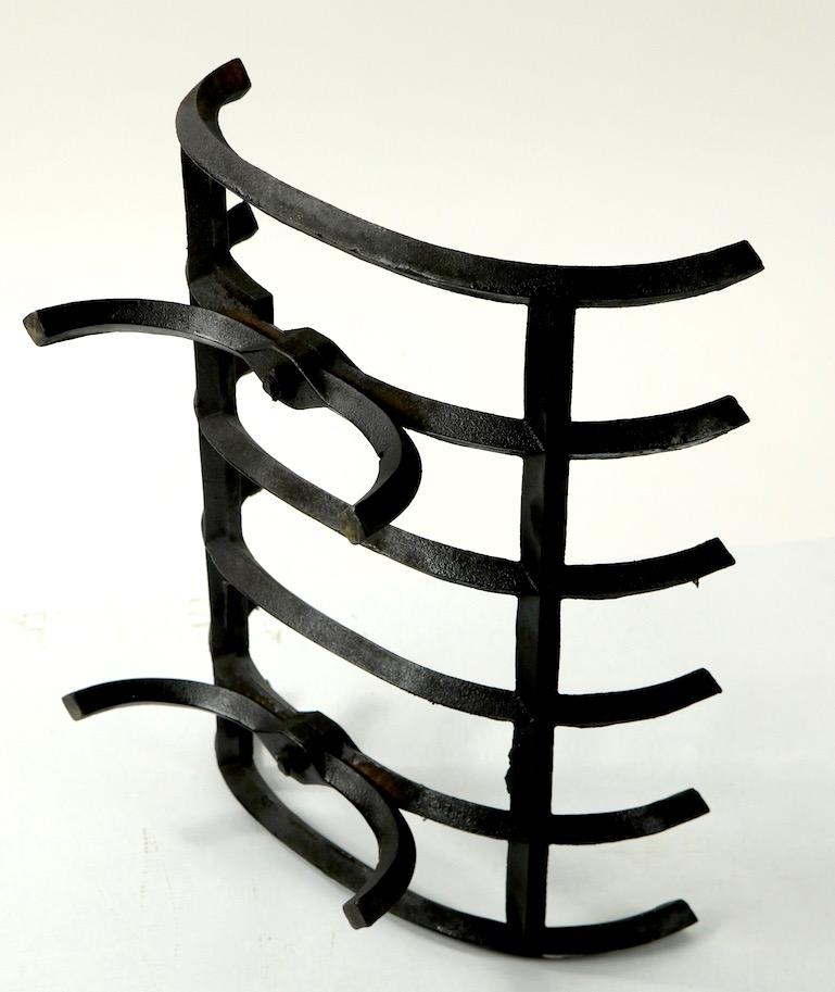 Well made, heavy cast iron fireplace grate in very good clean and ready to use condition. This example has a cast flame mark, as pictured in images.