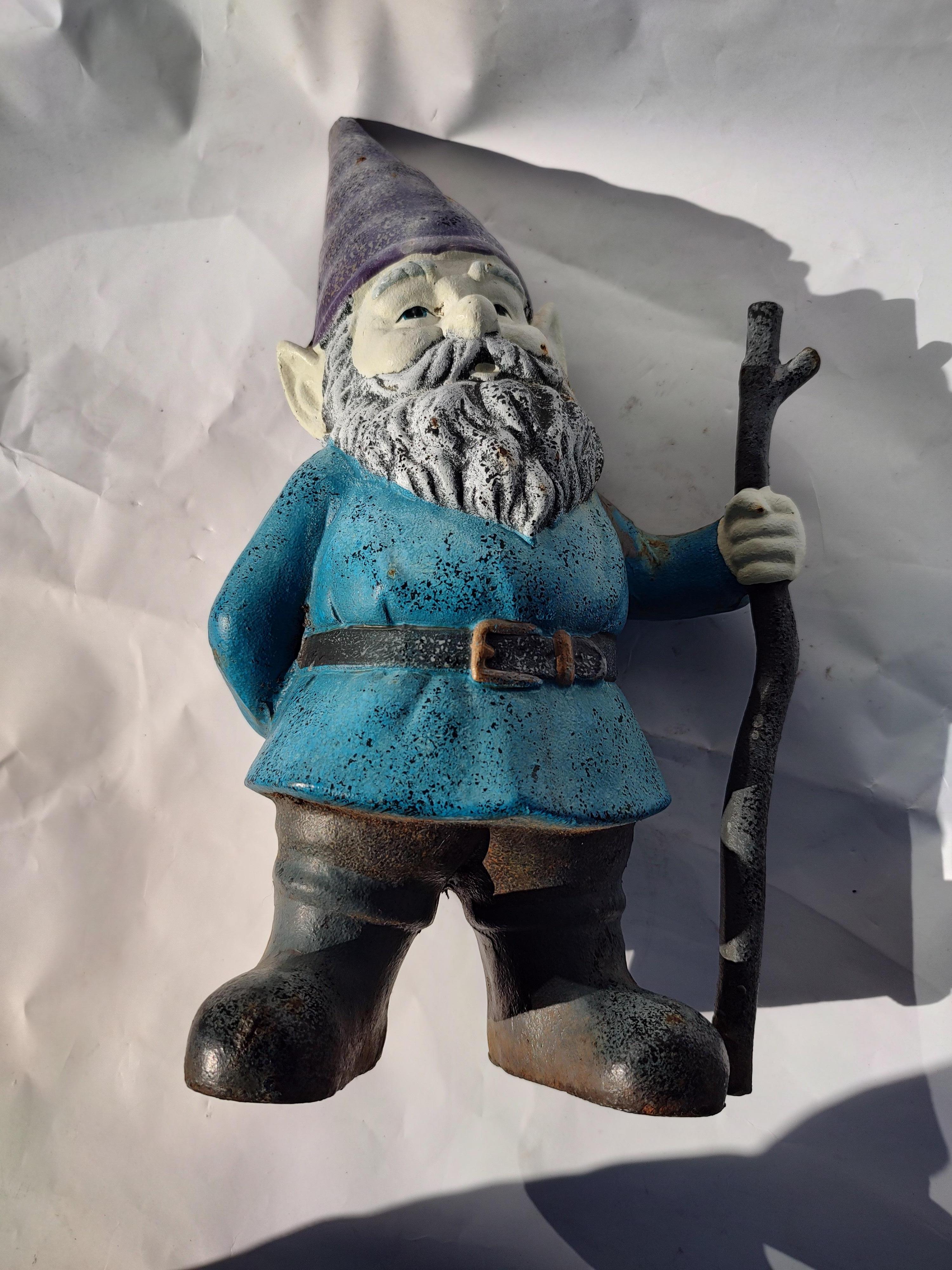 Very detailed cast iron Gnome with Walking Stick. Great color retention with no damage, just normal fade of the paint. Love that purple hat!