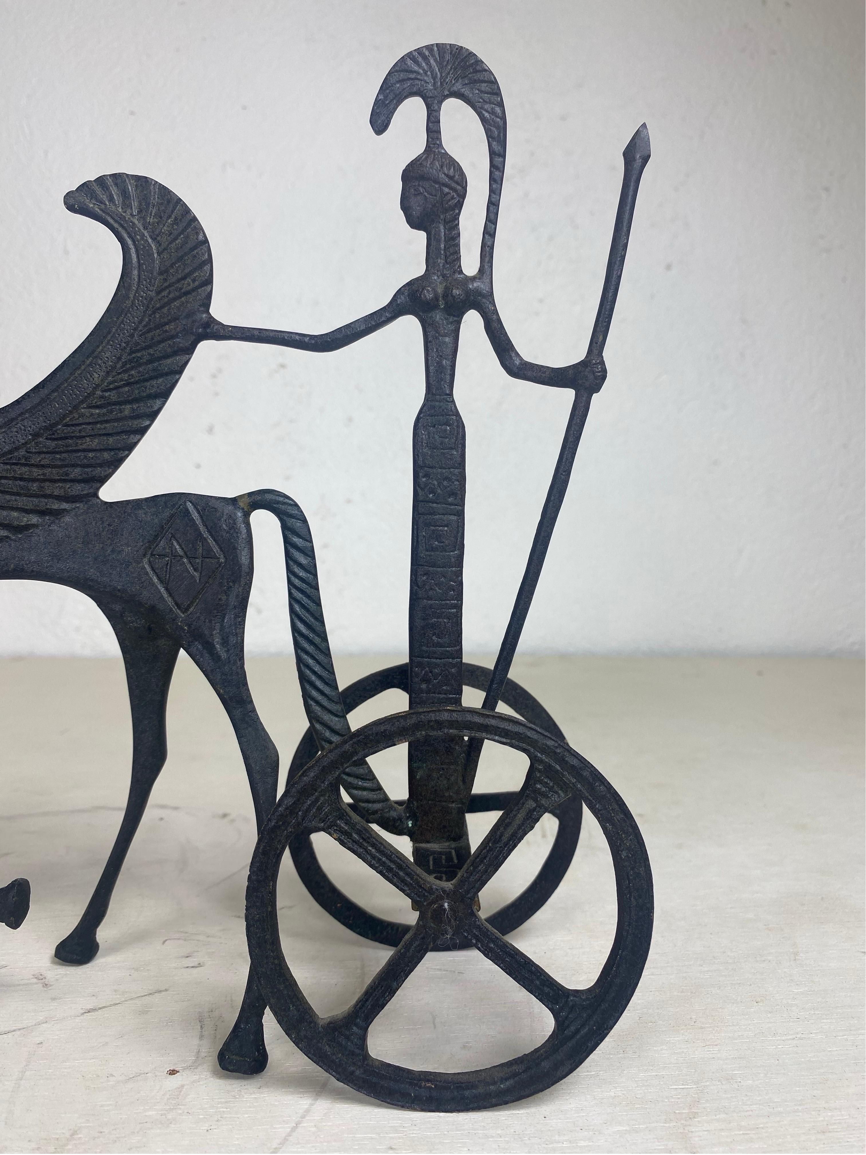 Mid century cast iron sculpture of mythical horse and figure. In Good Condition For Sale In Allentown, PA