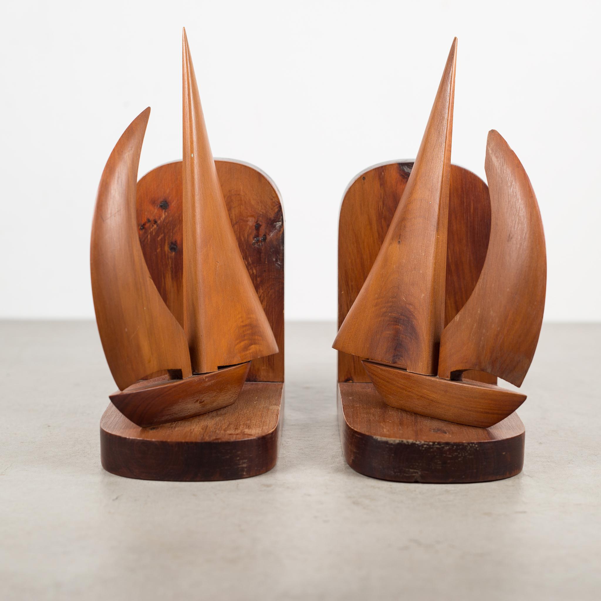 About

A pair of carved Cedar souvenir sailboat bookends from Bermuda. Signed on the bottom and given has a gift in 1965. Each sail has been fashioned to insert in the boat independently.

Creator unknown.
Date of manufacture circa