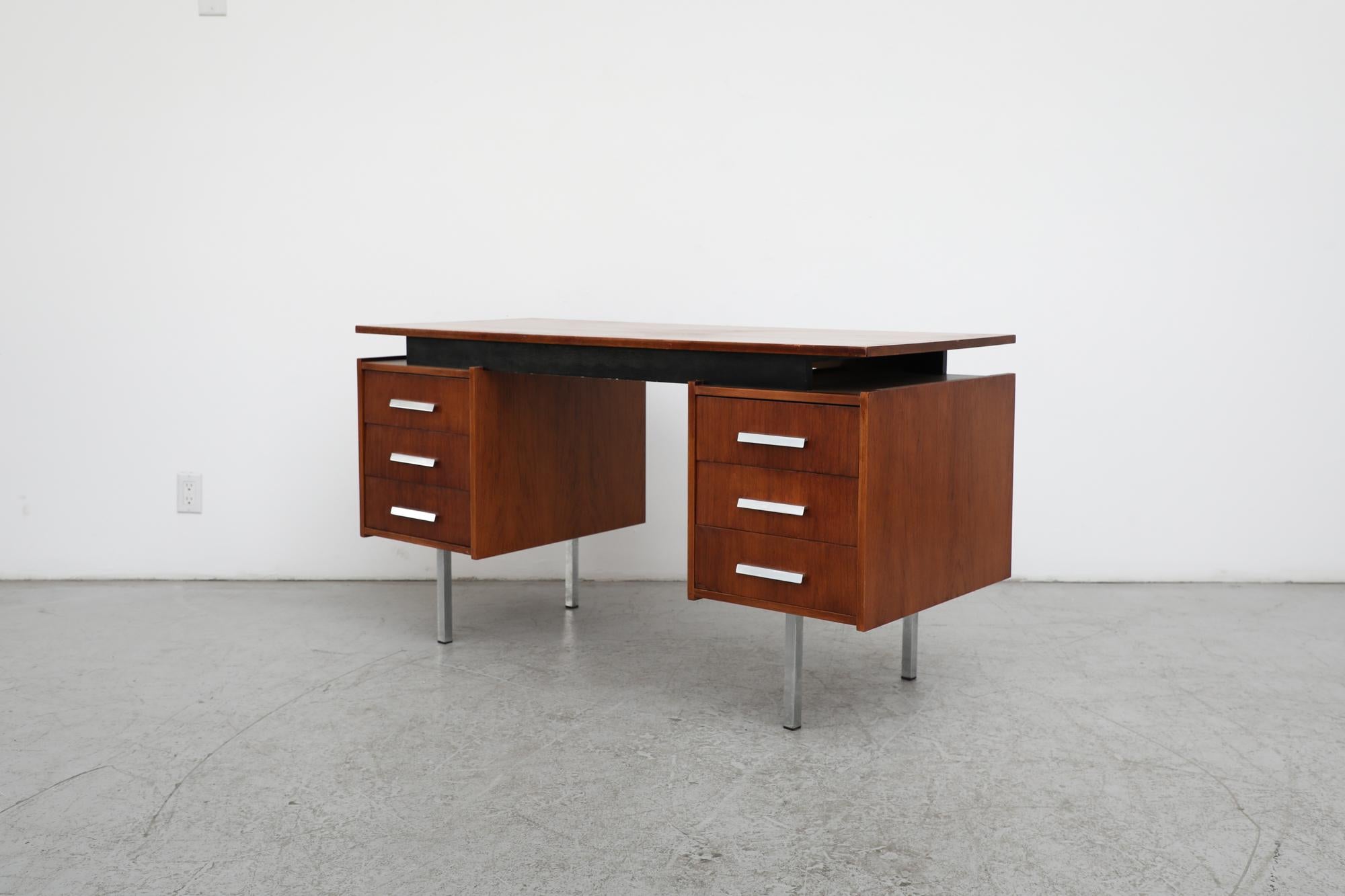 Mid-Century 6 Drawer Teak Tijsselling Desk with Floating Top and Chrome Legs In Good Condition For Sale In Los Angeles, CA