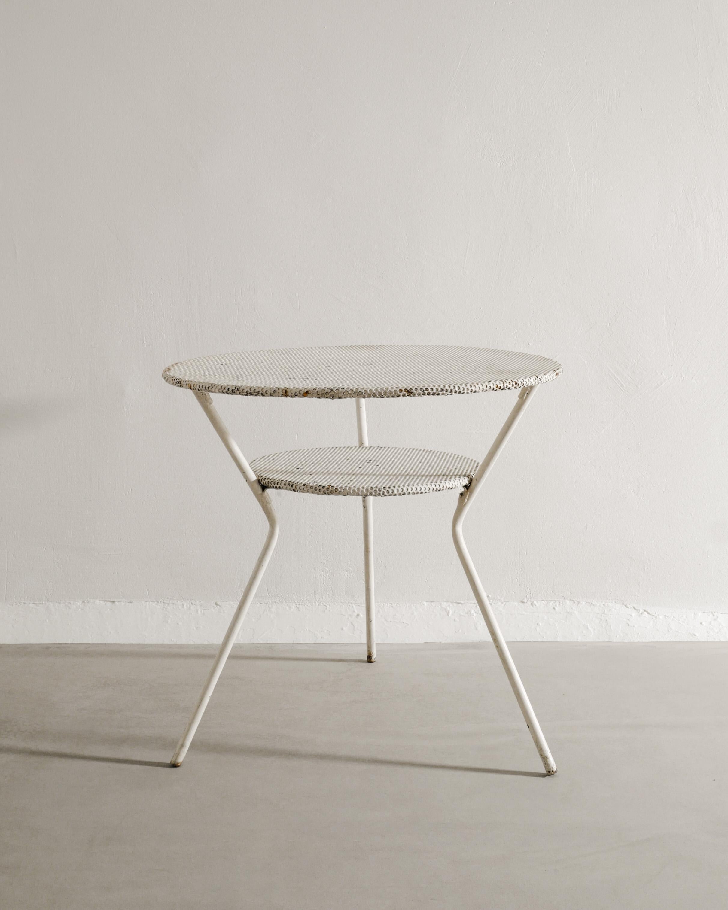Rare mid century round dining garden table in white lacquered metal in style of Mathieu Matégot. Produced in France, 1950s. In good original condition. 

Dimensions: H: 65 cm / 25.60
