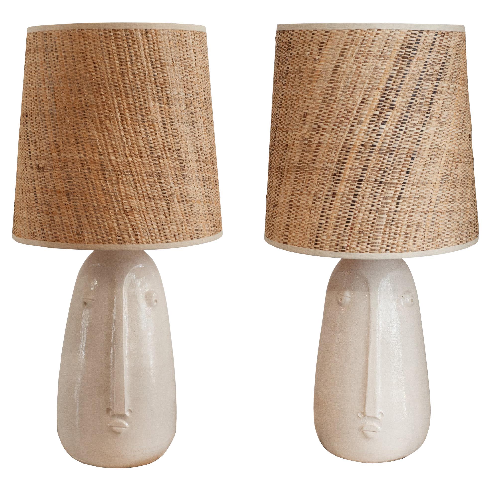 Mid Century Ceramic Abstracted Faces Lamps with Natural Woven Shades For Sale